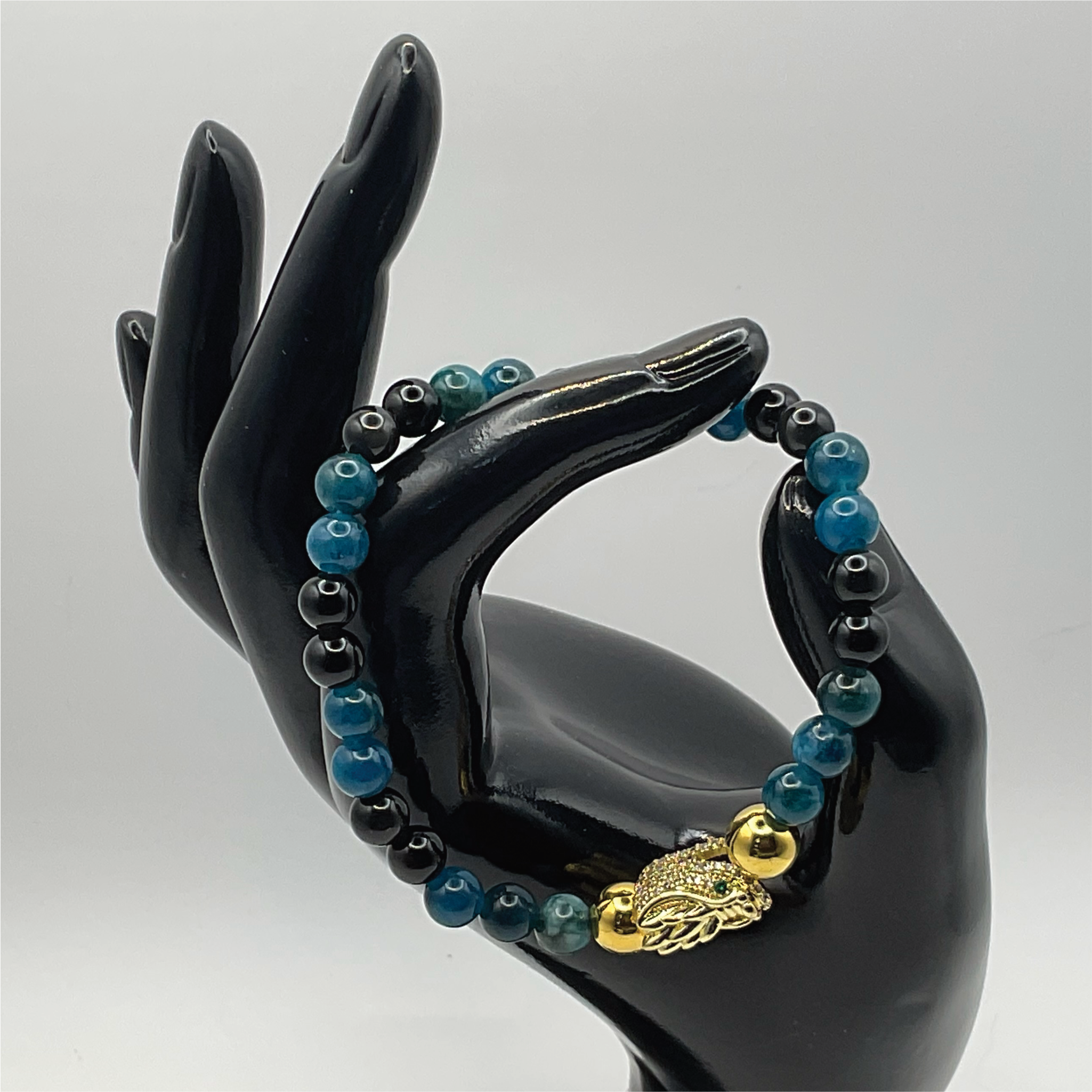 Blue Apatite Black Agate Dragon Charm Bracelet with Gold Tone Spacers