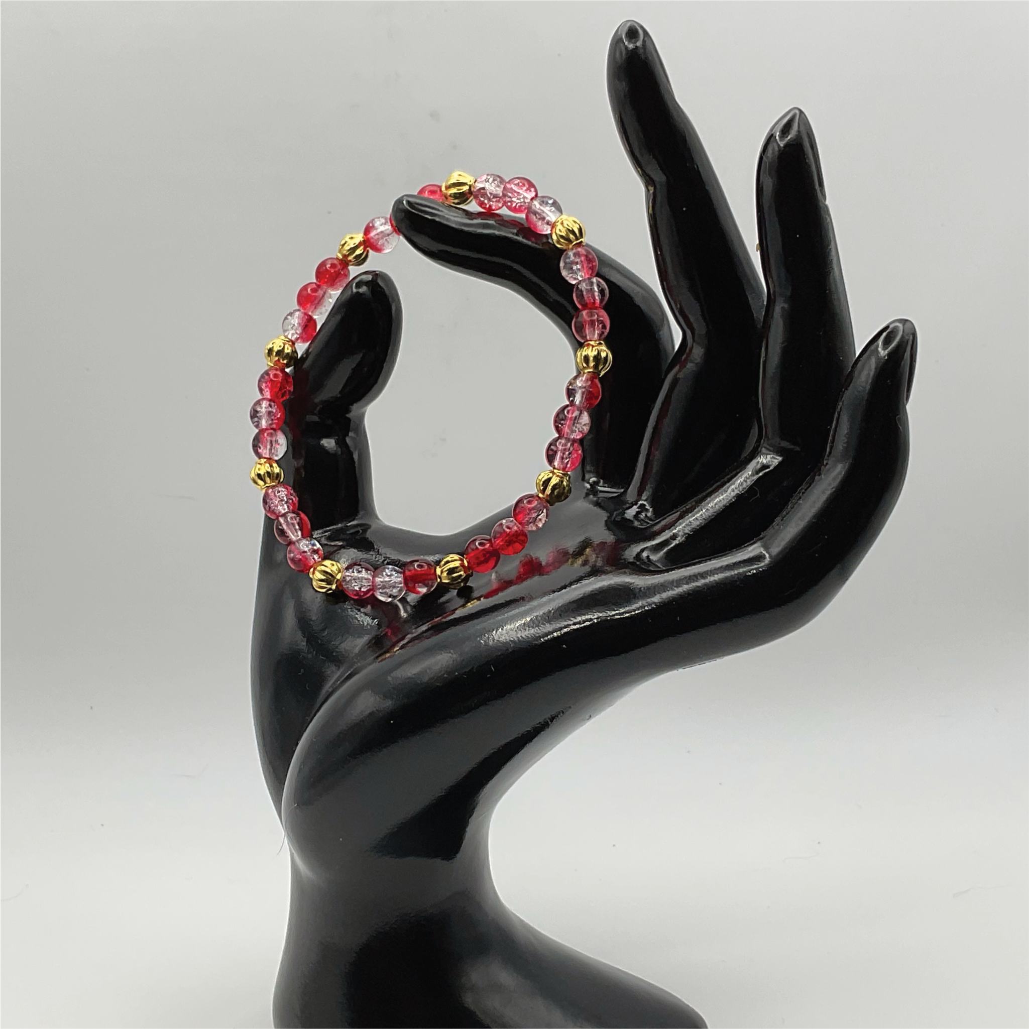 Red Glass Bracelet with Gold Lobed Spacers