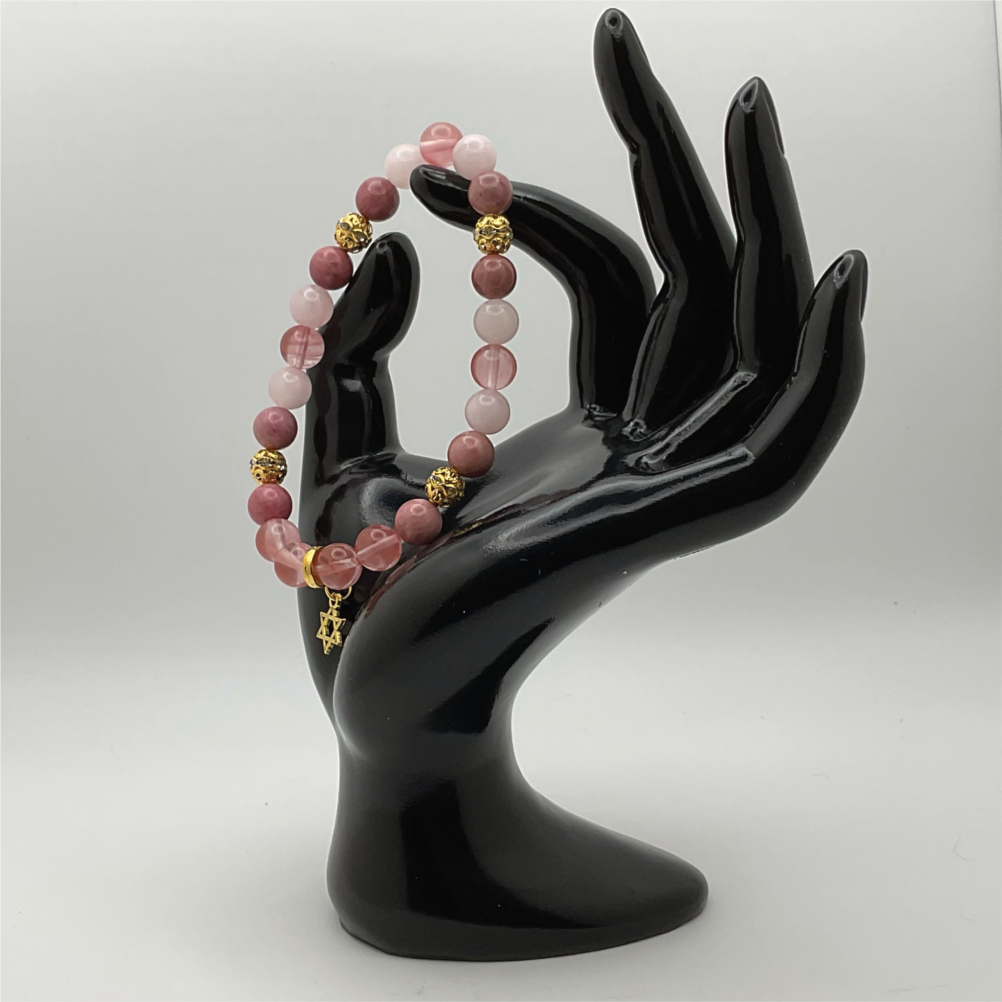 Pulsera con dije de estrella judía de cuarzo cornalina con separadores de cristal dorado