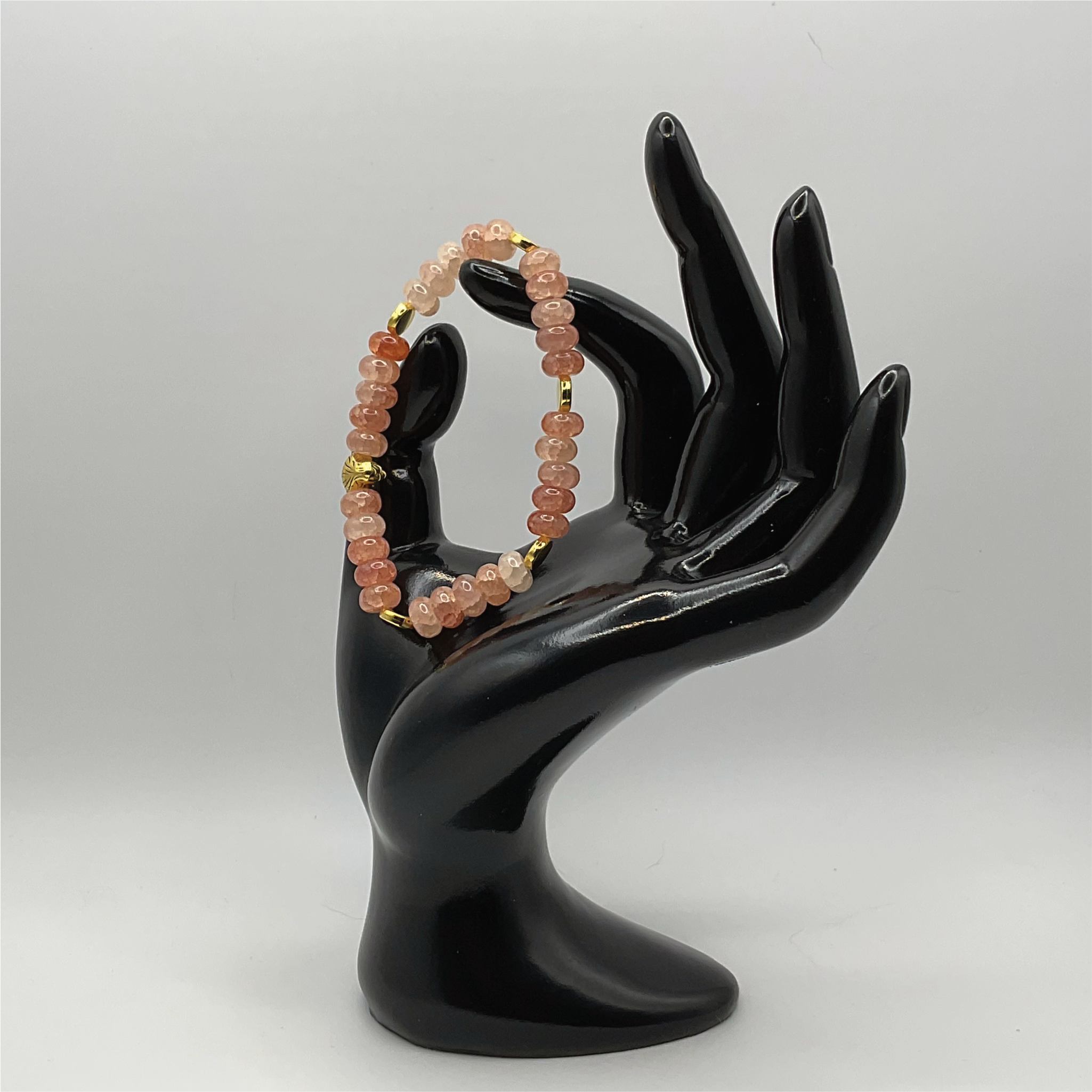 Rose Quartz Panther Charm Bracelet with Gold Tone Disc Spacers