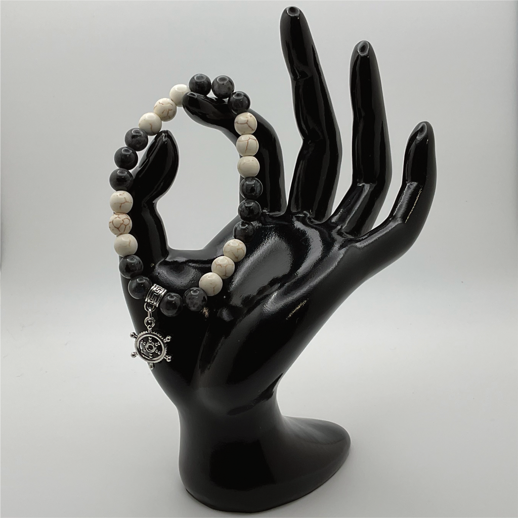 Pulsera con dije de timón de piedra Picasso de magnesita