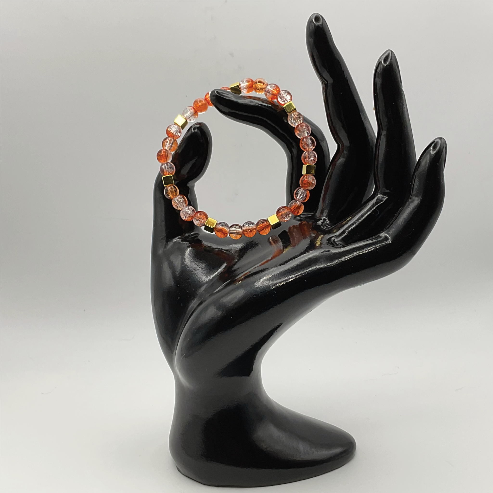 Orange Crackle Glass Bracelet with Square Gold Spacers