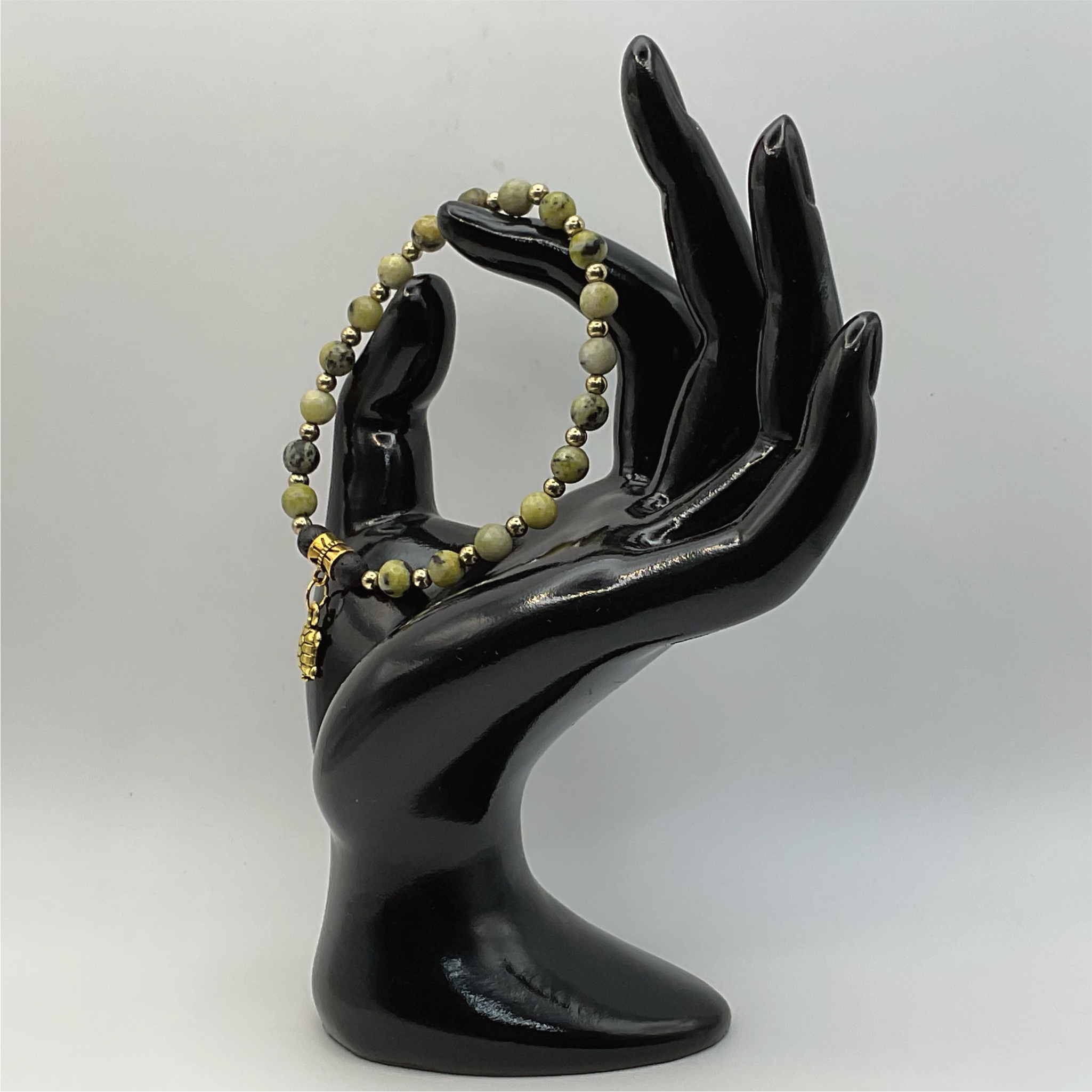 Serpentine Lava Turtle Charm Bracelet with Gold Spacers