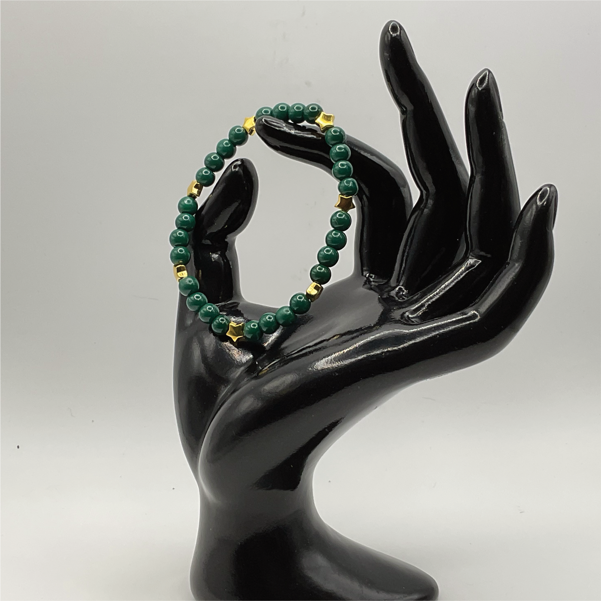 Dark Green Glass Bracelet with Gold Star Spacers