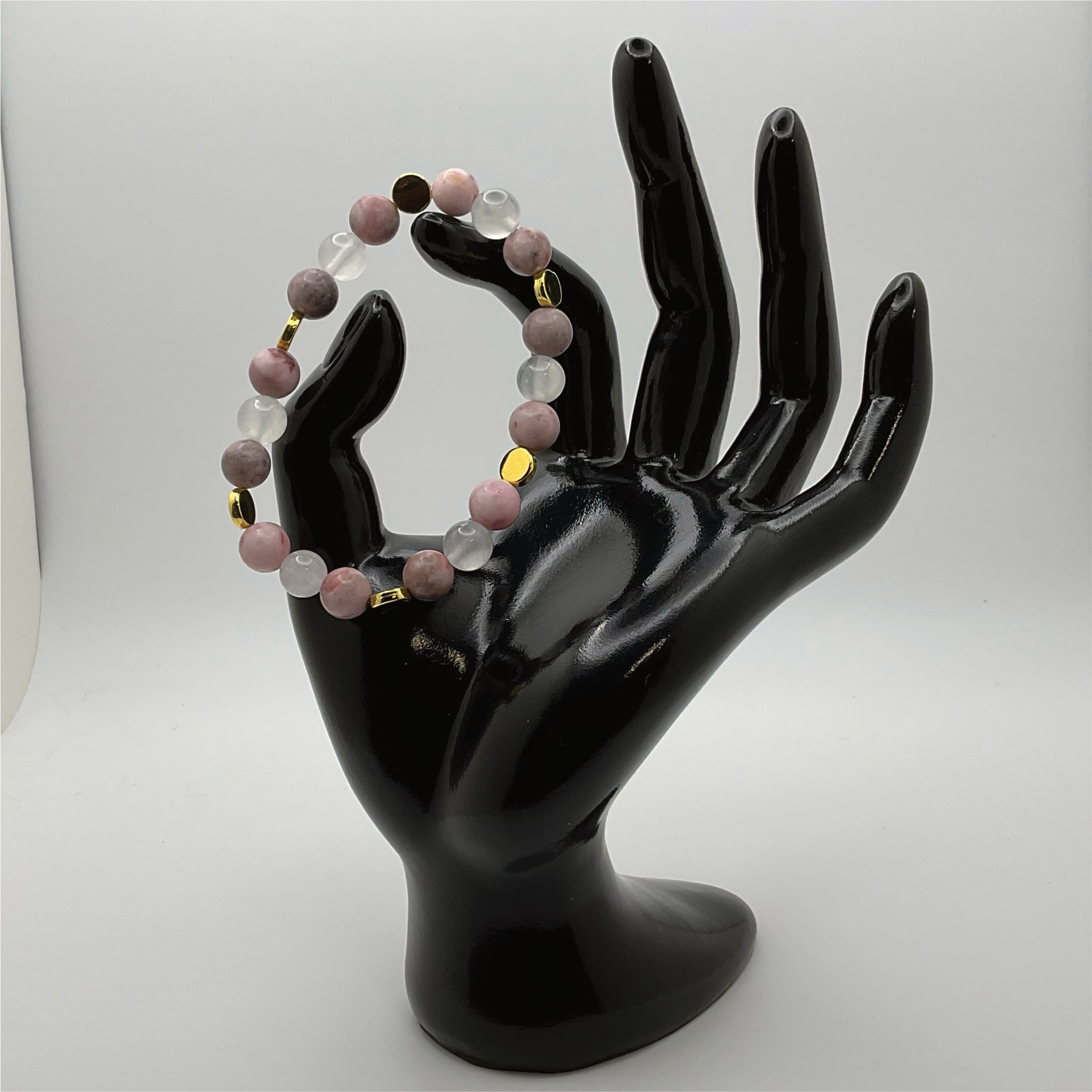 Pulsera de cuarzo lechoso y ópalo rosa con espaciadores de disco dorados
