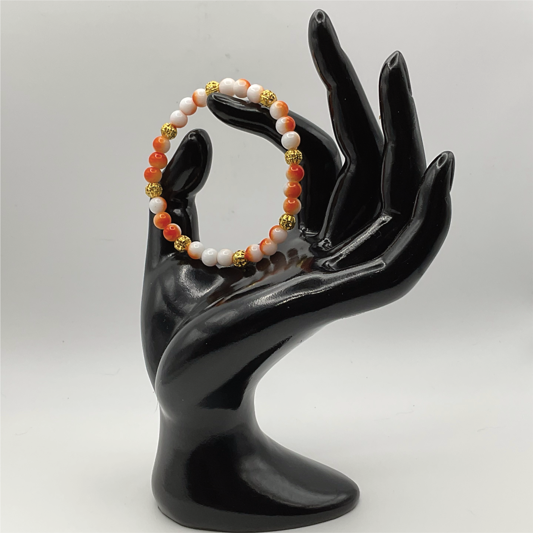 15.5 cm (6.1") Orange White Bracelet with Gold Spacers