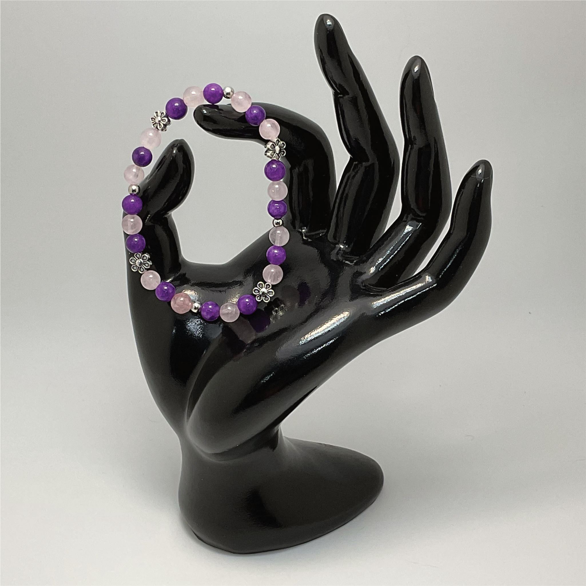 Pulsera de amatista y cuarzo rosa con espaciadores de plata