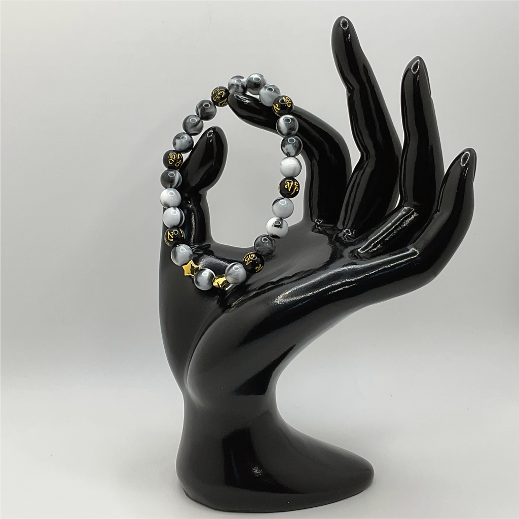 Pulsera Pixiu de Magnesita Negra con Separadores de Estrella Dorados