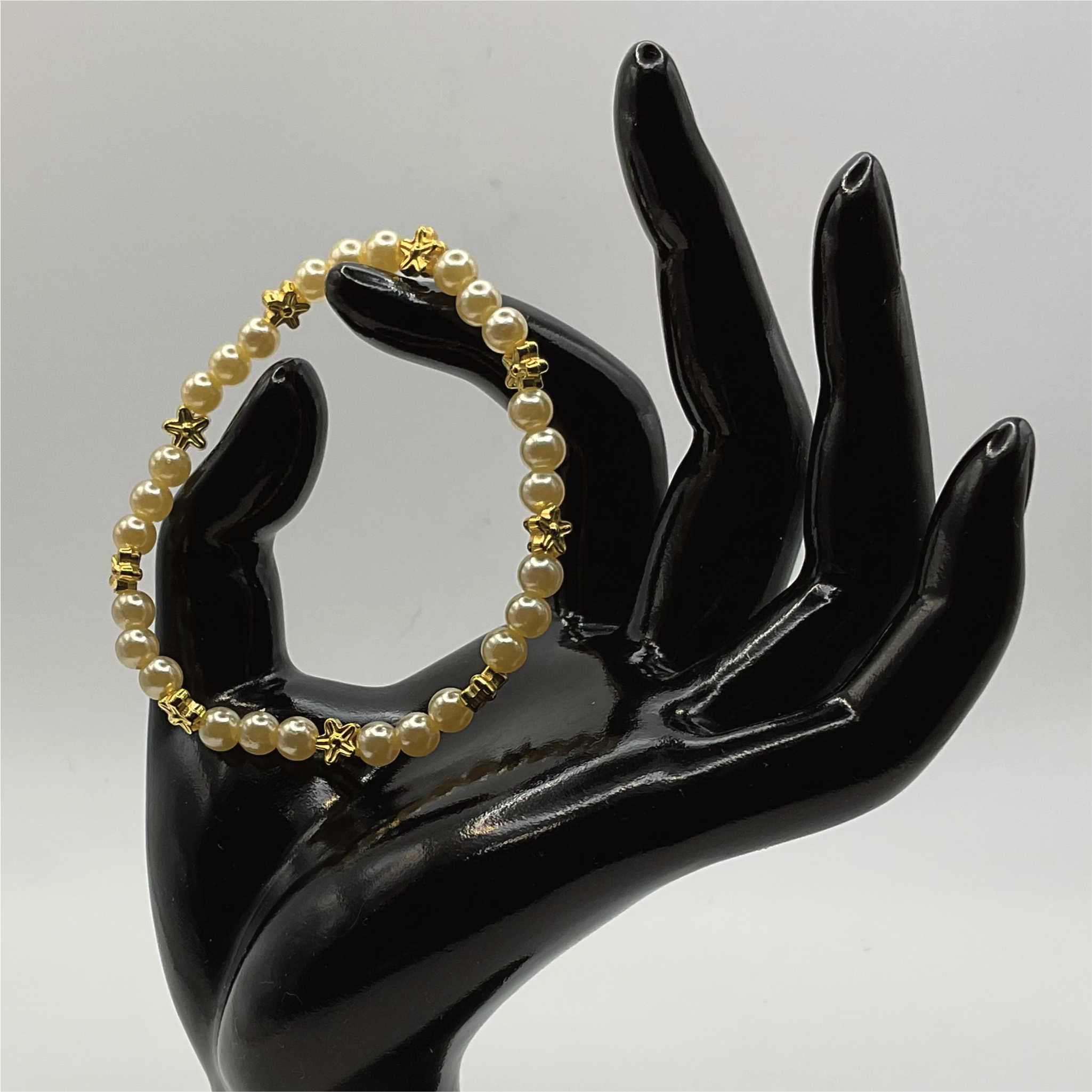 Golden Glass Bracelet with Gold Star Spacers