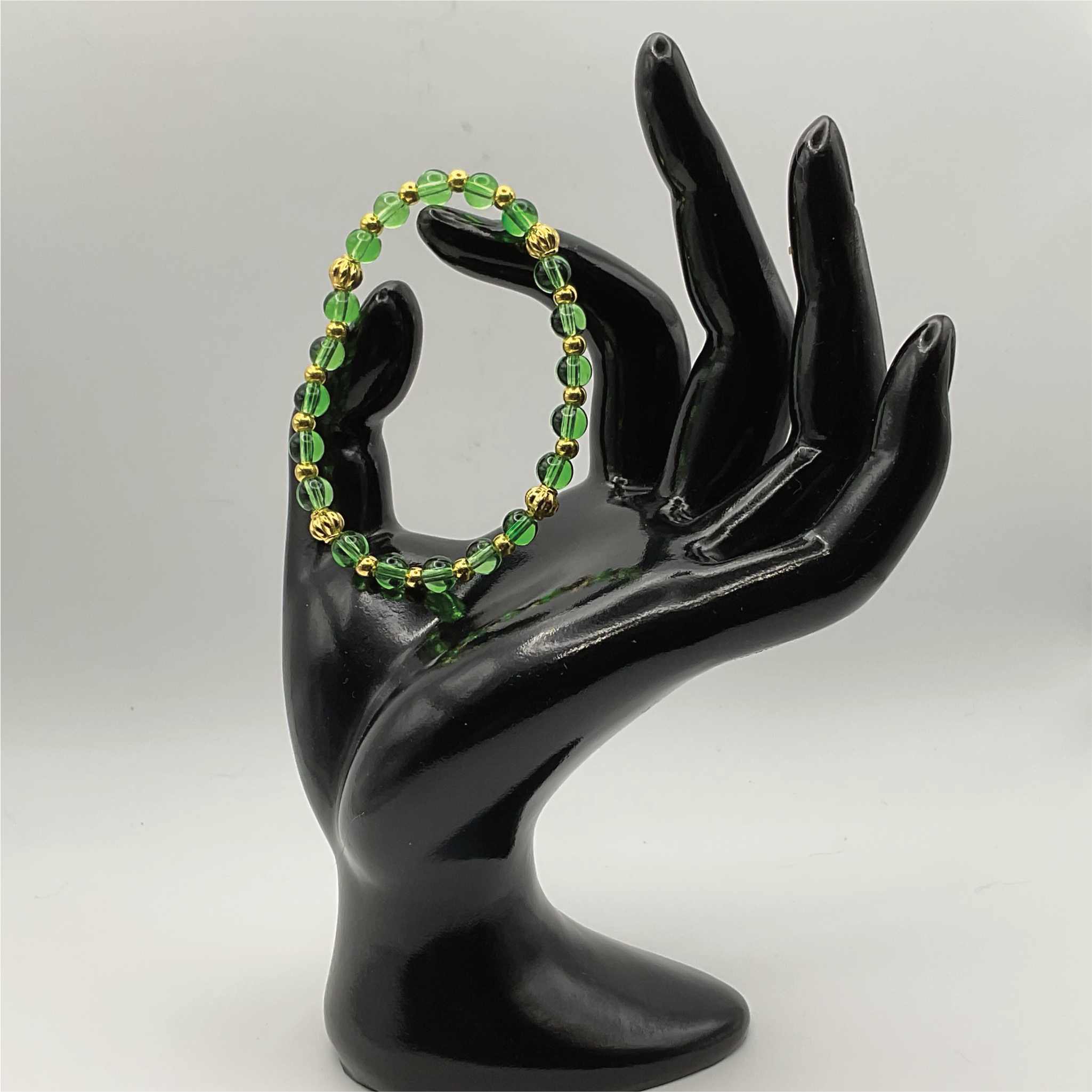 Green Glass Bracelet with Gold Spacers