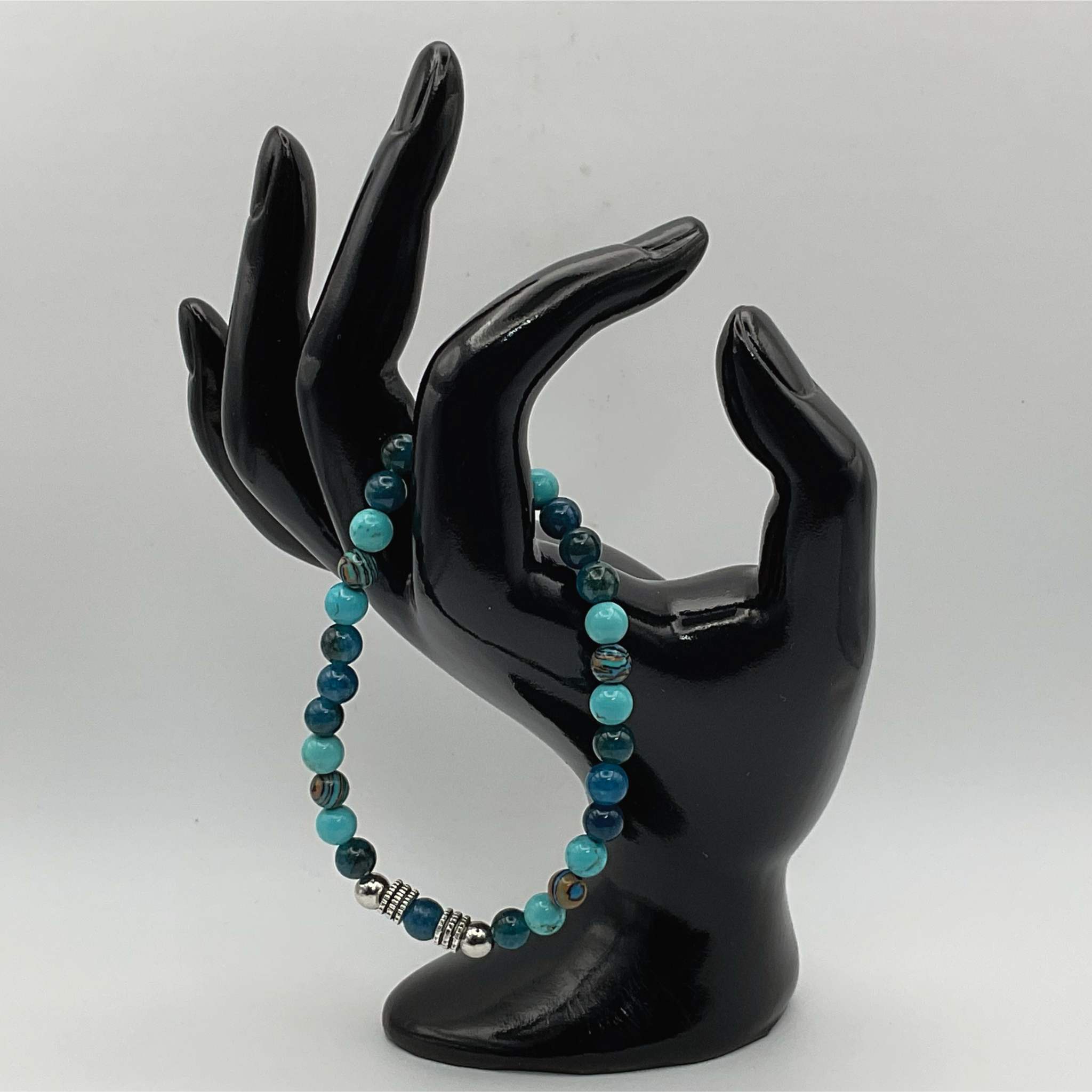Pulsera de apatita azul con espaciadores plateados