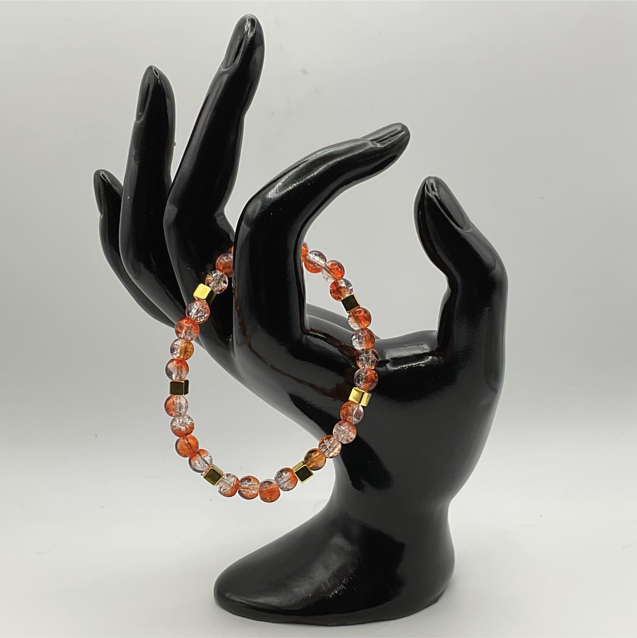 Orange Crackle Glass Bracelet with Square Gold Spacers