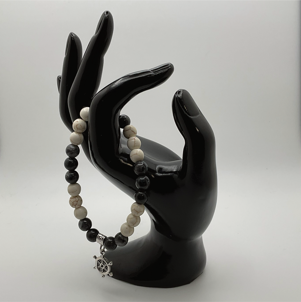 Pulsera con dije de timón de piedra Picasso de magnesita