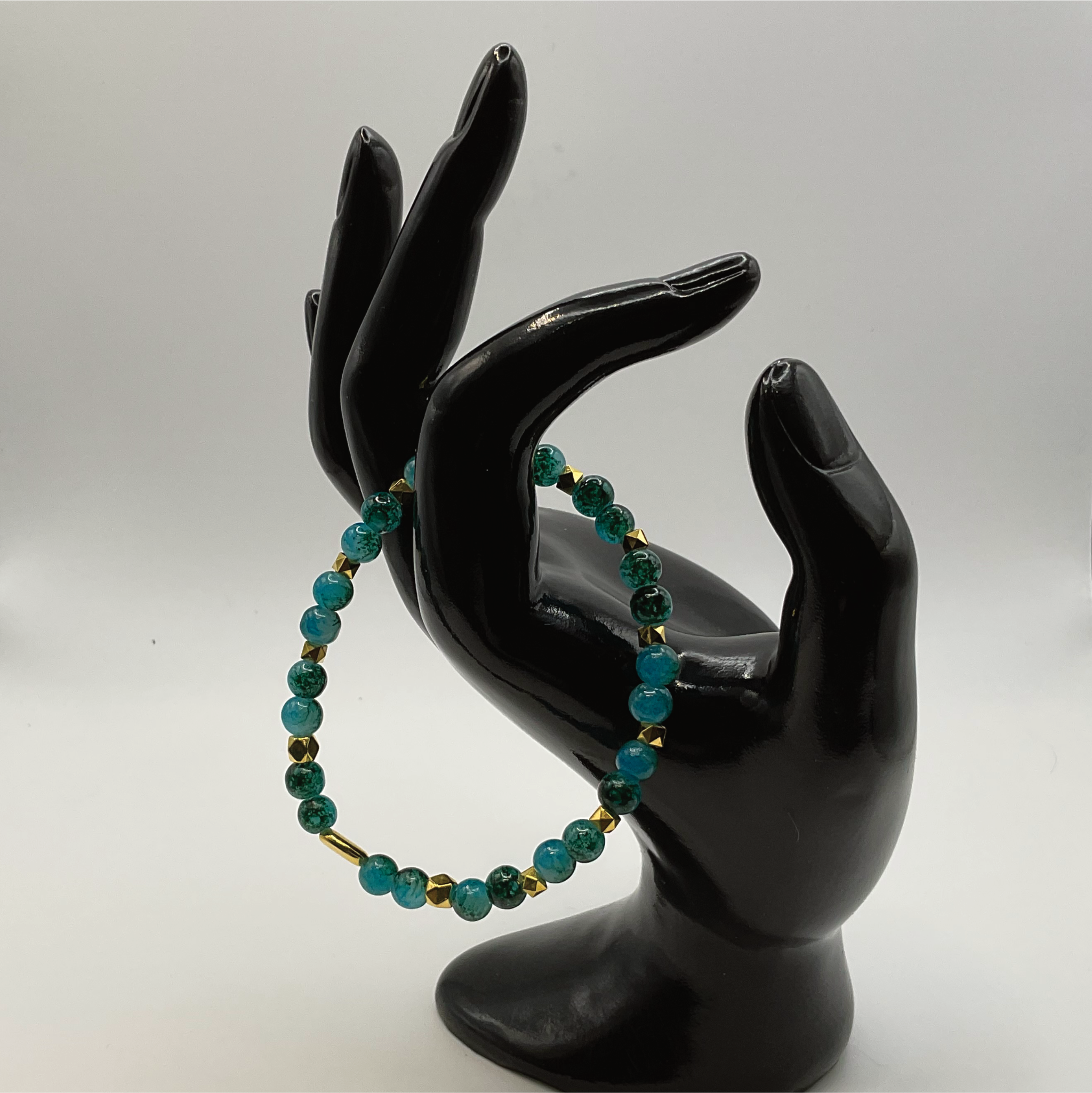 Blue Green Glass Bracelet with Gold Disc Spacers