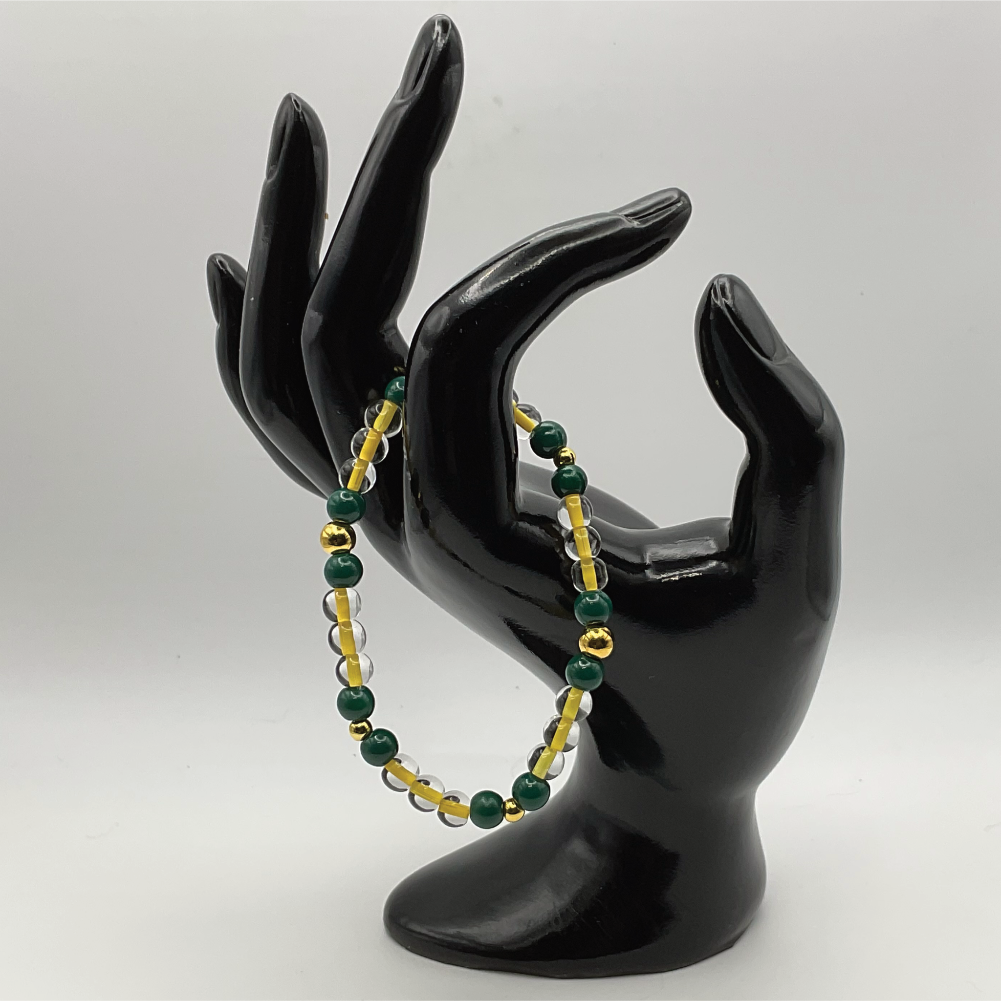 Yellow Green Glass Bracelet with Gold Spacers