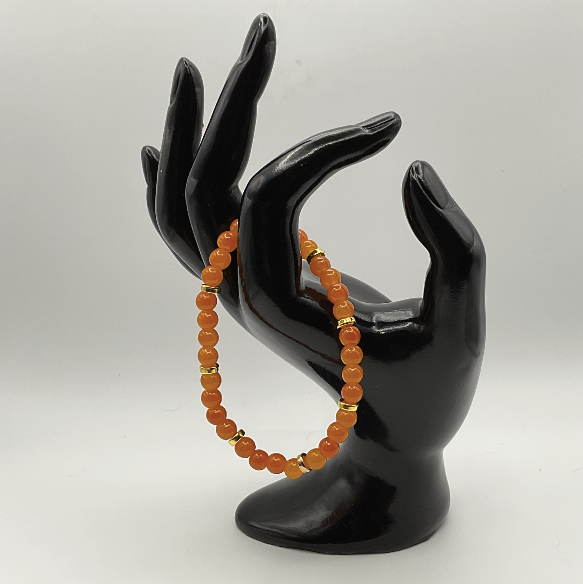 Orange Glass Bracelet with Gold Spacers