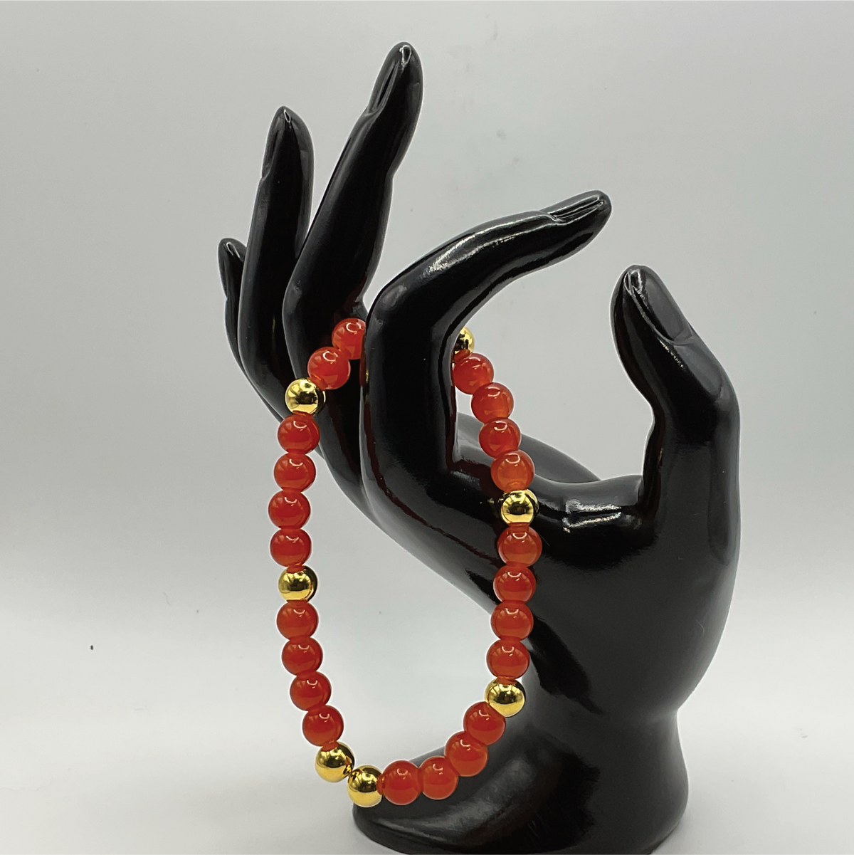 Orange Glass Bracelet with Gold Spacers