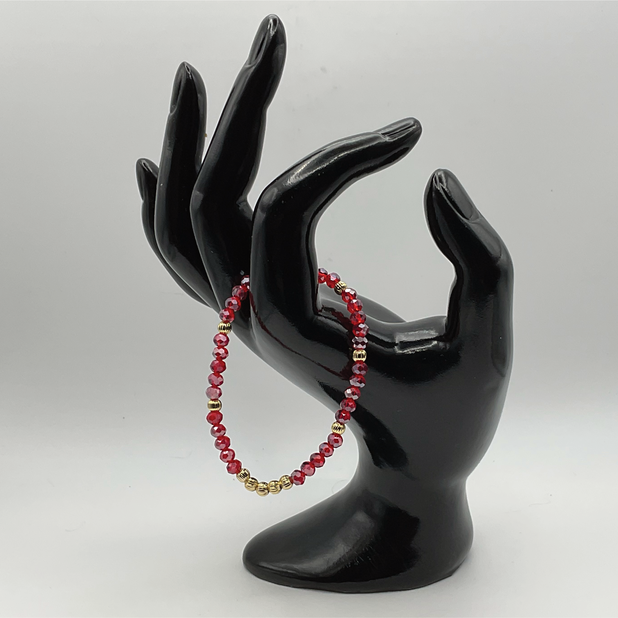 Red Glass Bracelet with Gold Lobed Spacers