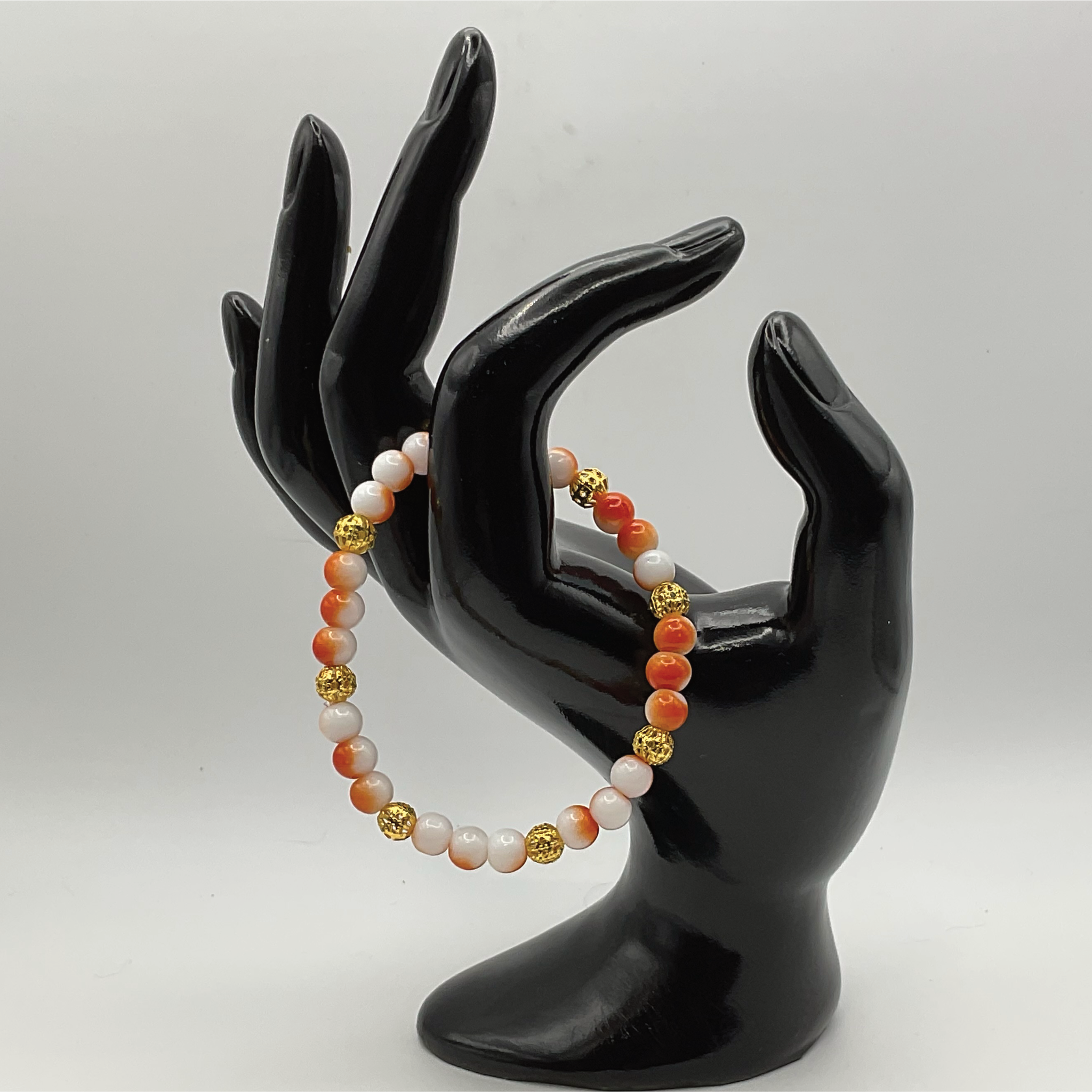 15.5 cm (6.1") Orange White Bracelet with Gold Spacers
