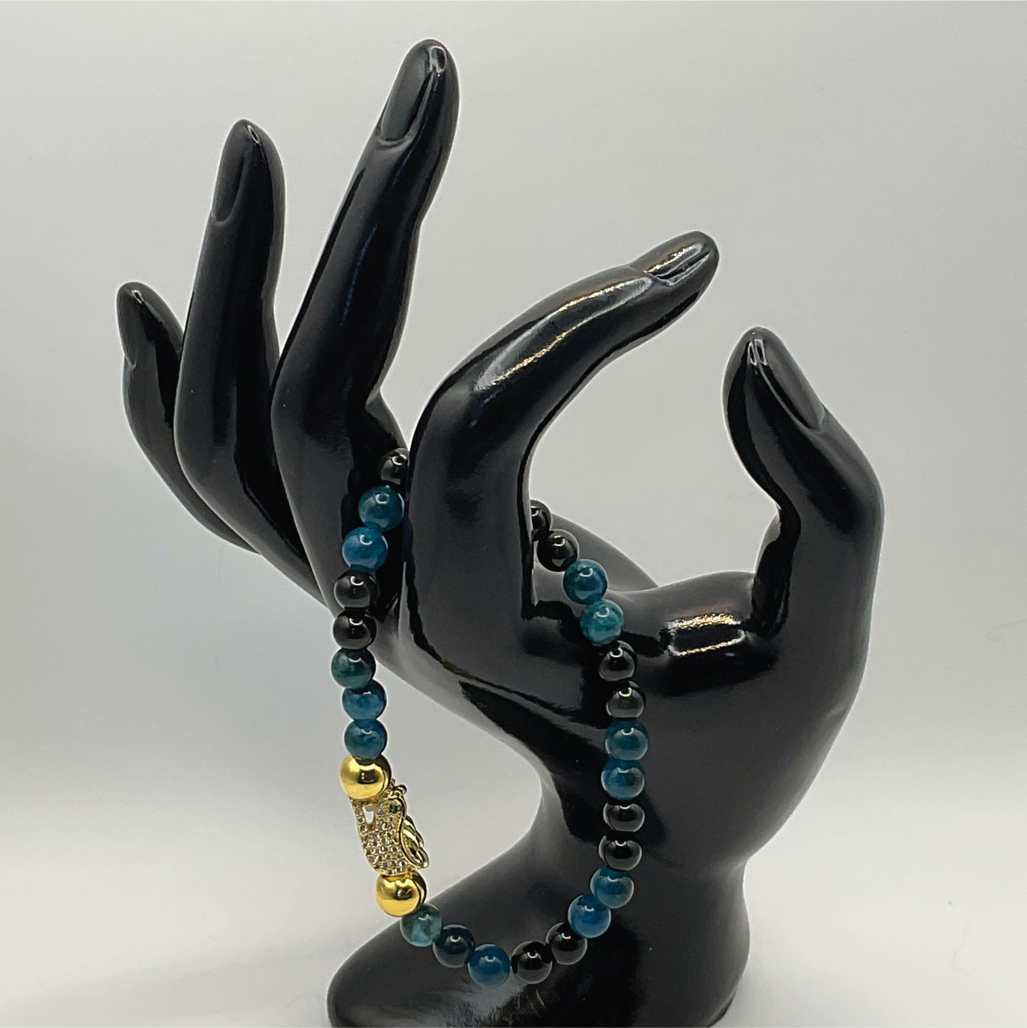 Blue Apatite Black Agate Dragon Charm Bracelet with Gold Tone Spacers