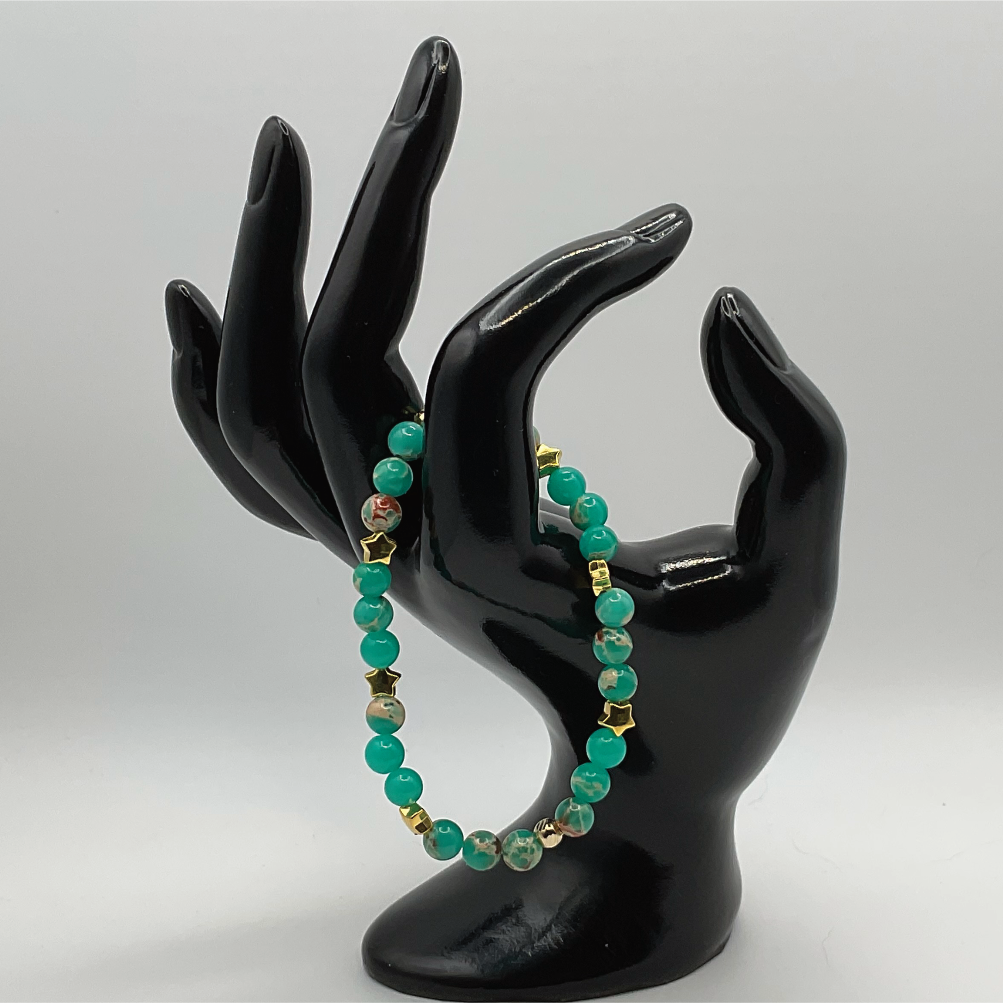 Green Chalcedony Bracelet with Gold Tone Star Spacers