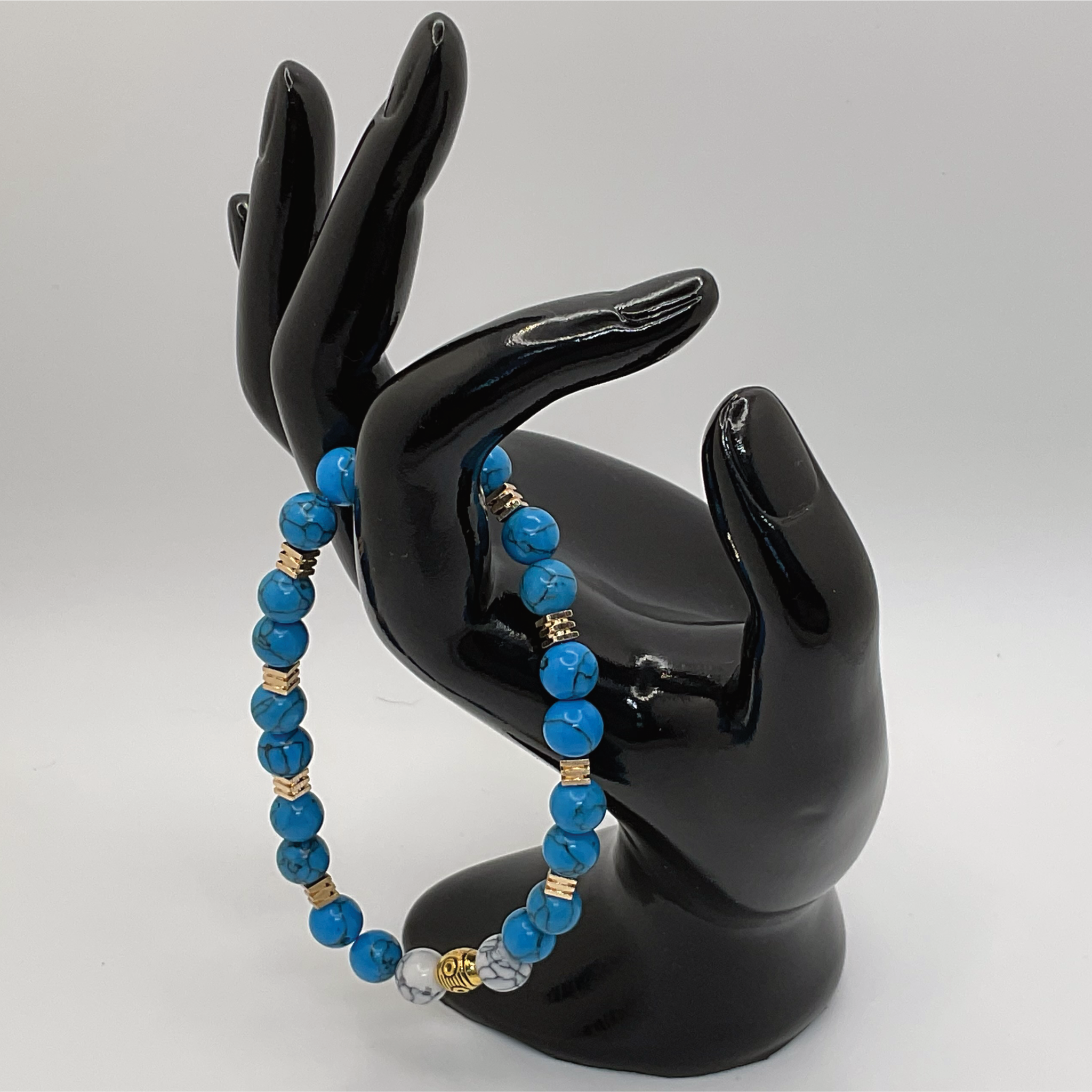 White Blue Howlite Bracelet with Gold Spacers