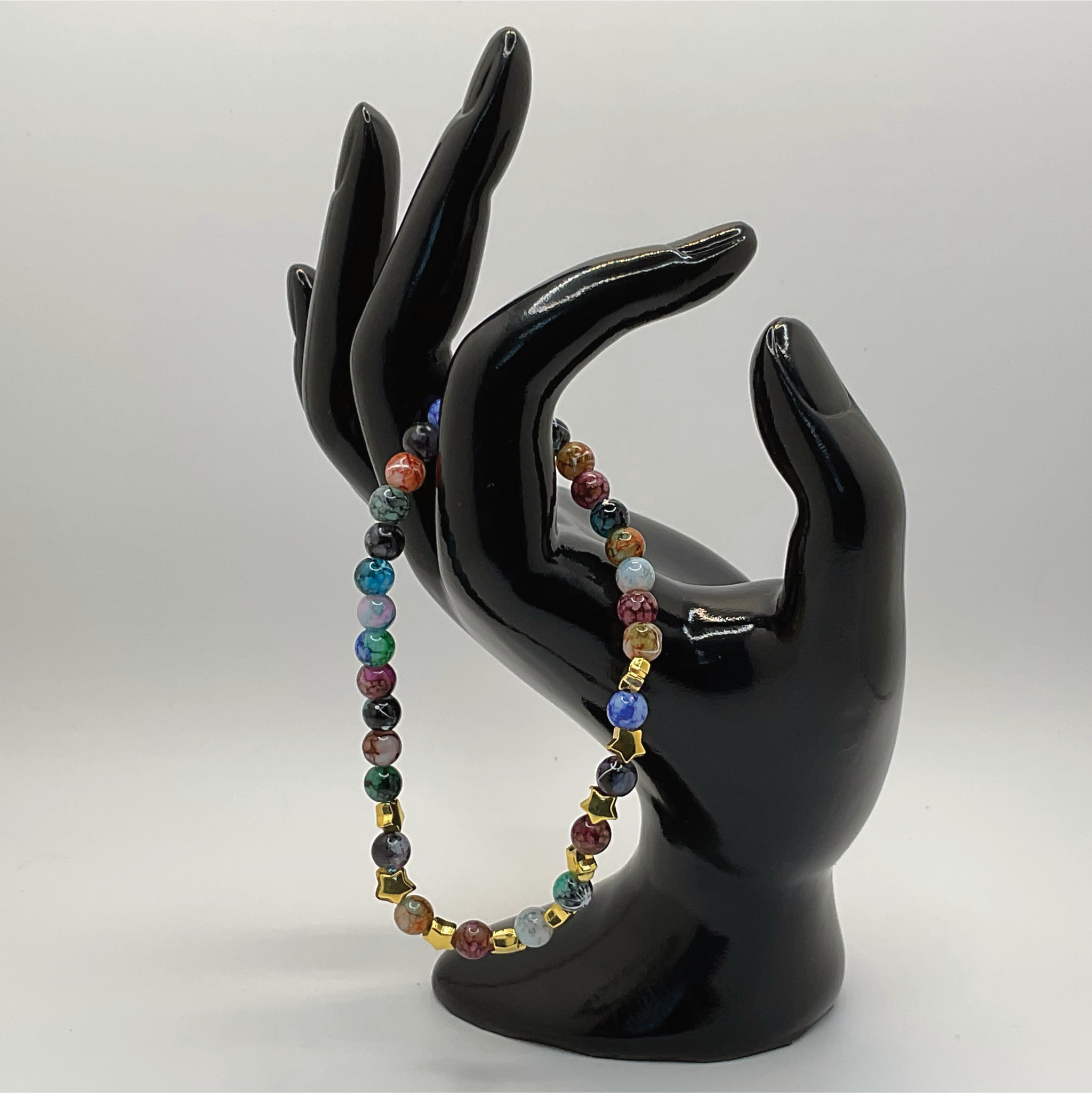 Multicolored Dragon Vein Agate Bracelet with Gold Star Spacers
