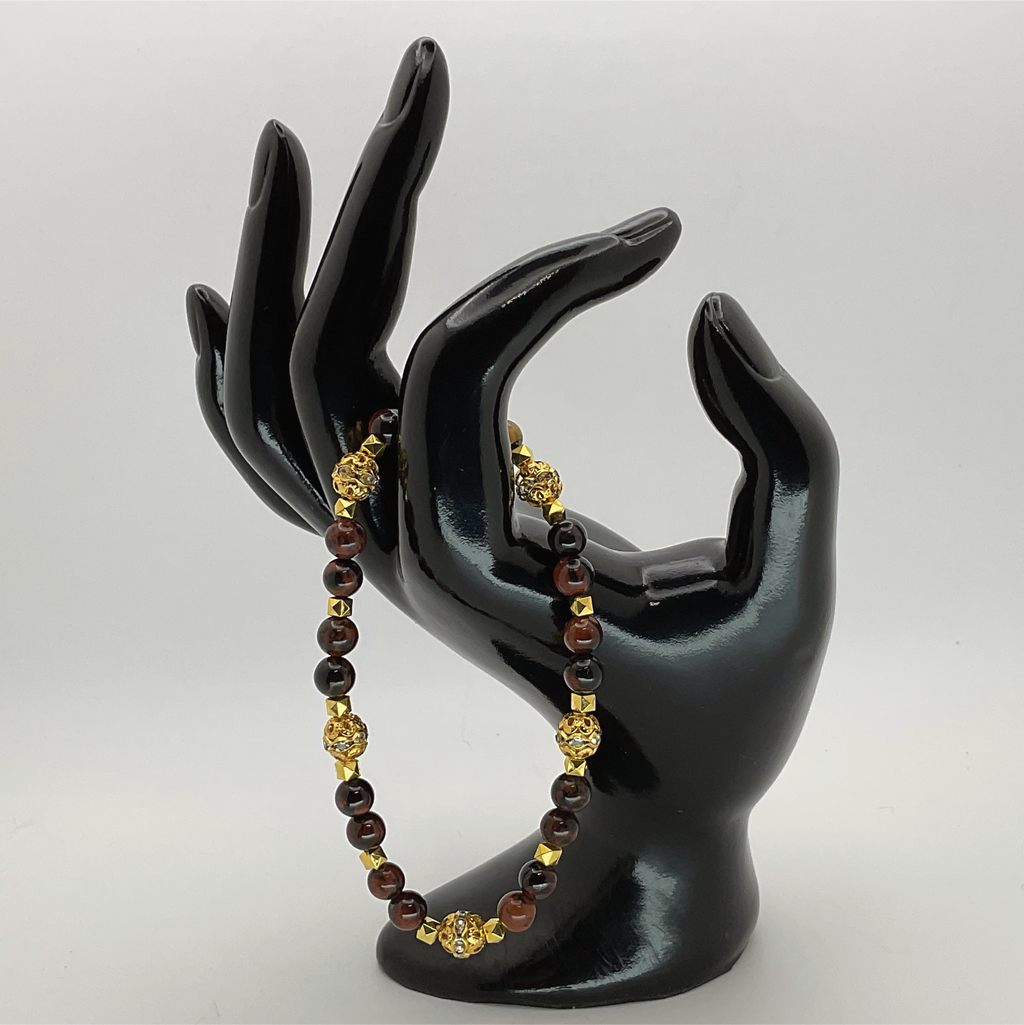 Pulsera de obsidiana caoba con espaciadores dorados
