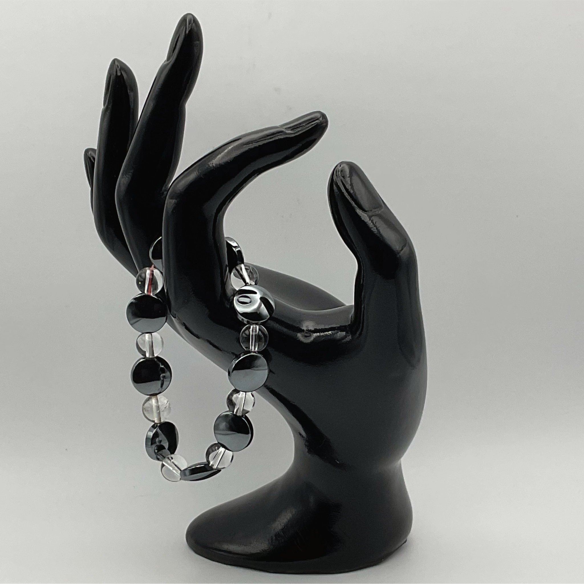 Pulsera de Cuarzo Transparente con Cuentas de Disco de Ónix