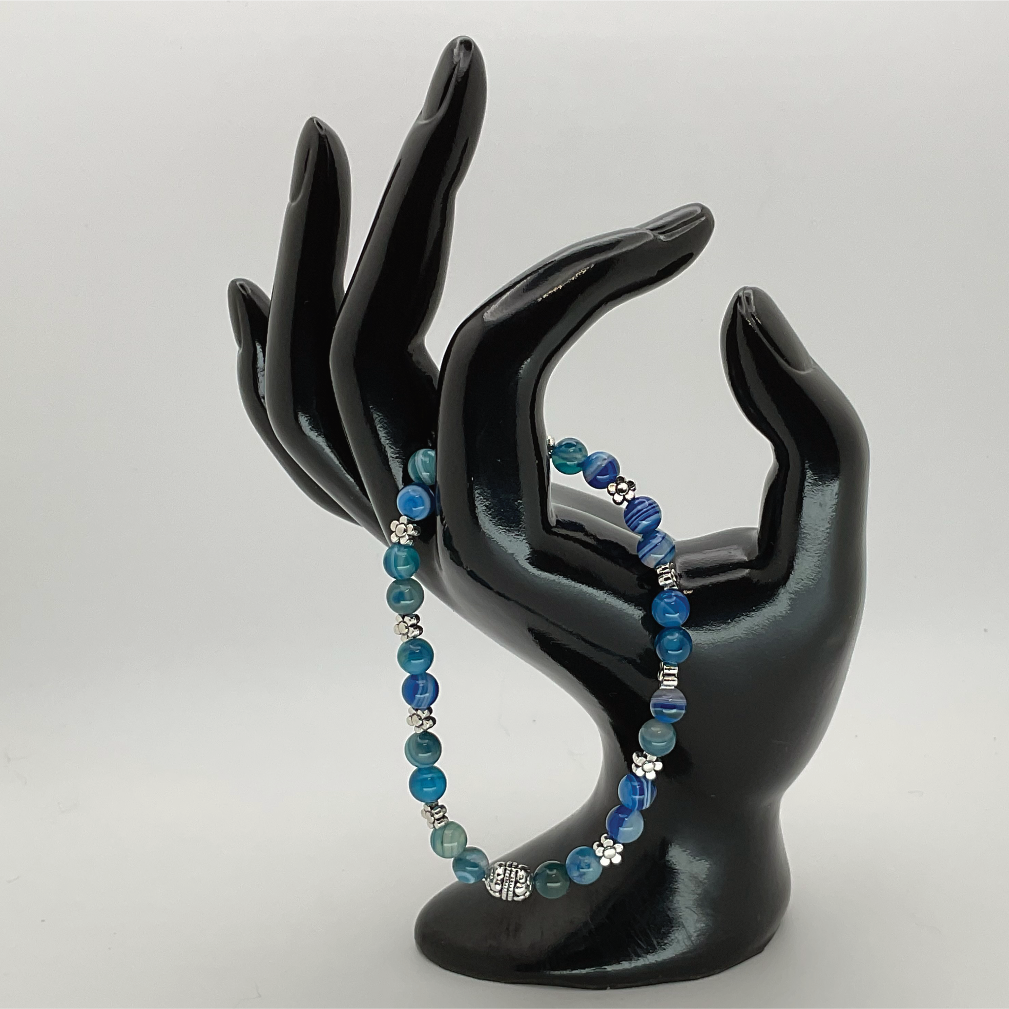 Pulsera de ágata Vena de Dragón Azul con espaciadores de barril y flor de plata