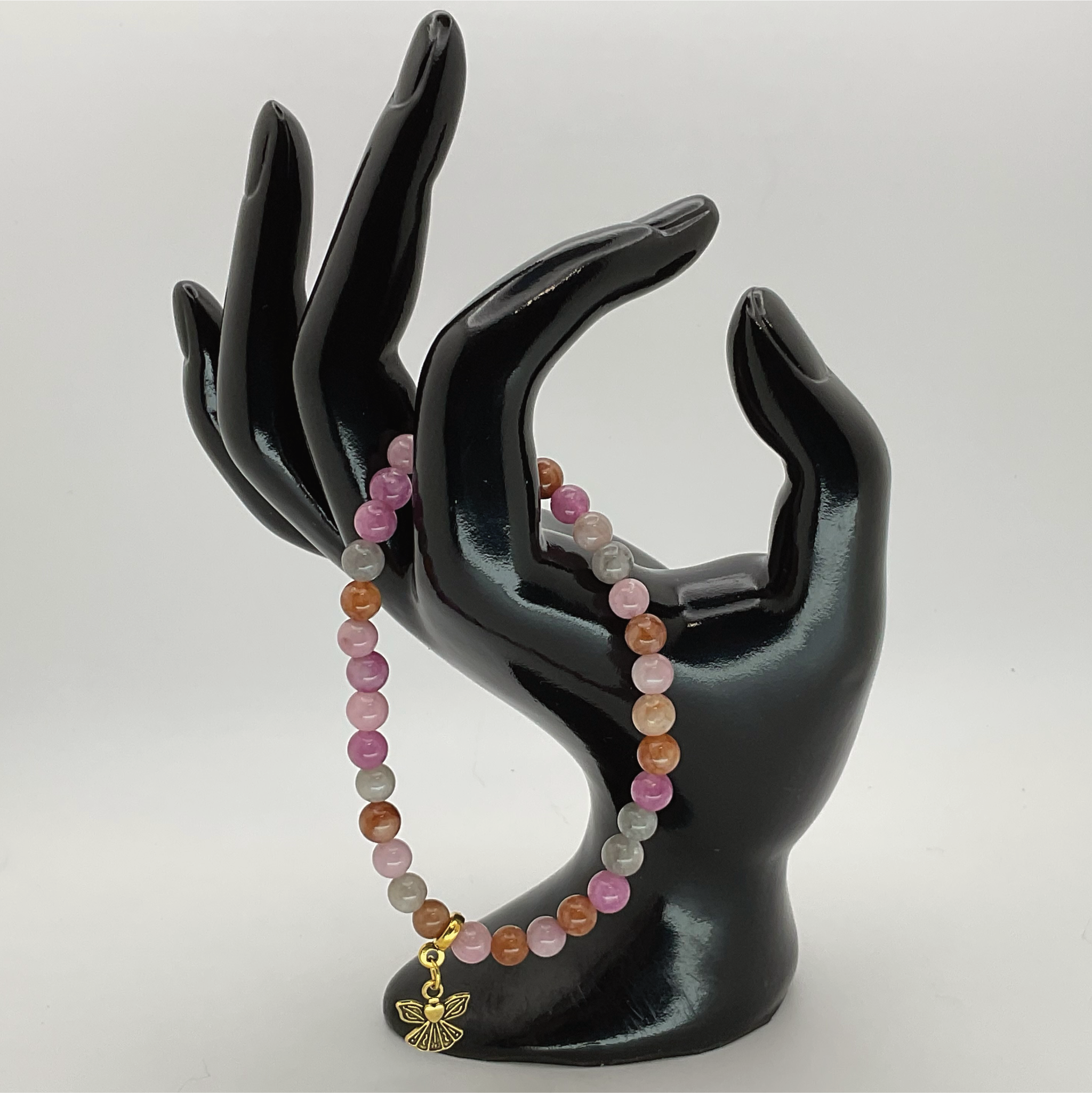 Pulsera de turmalina rubelita con dije de ángel