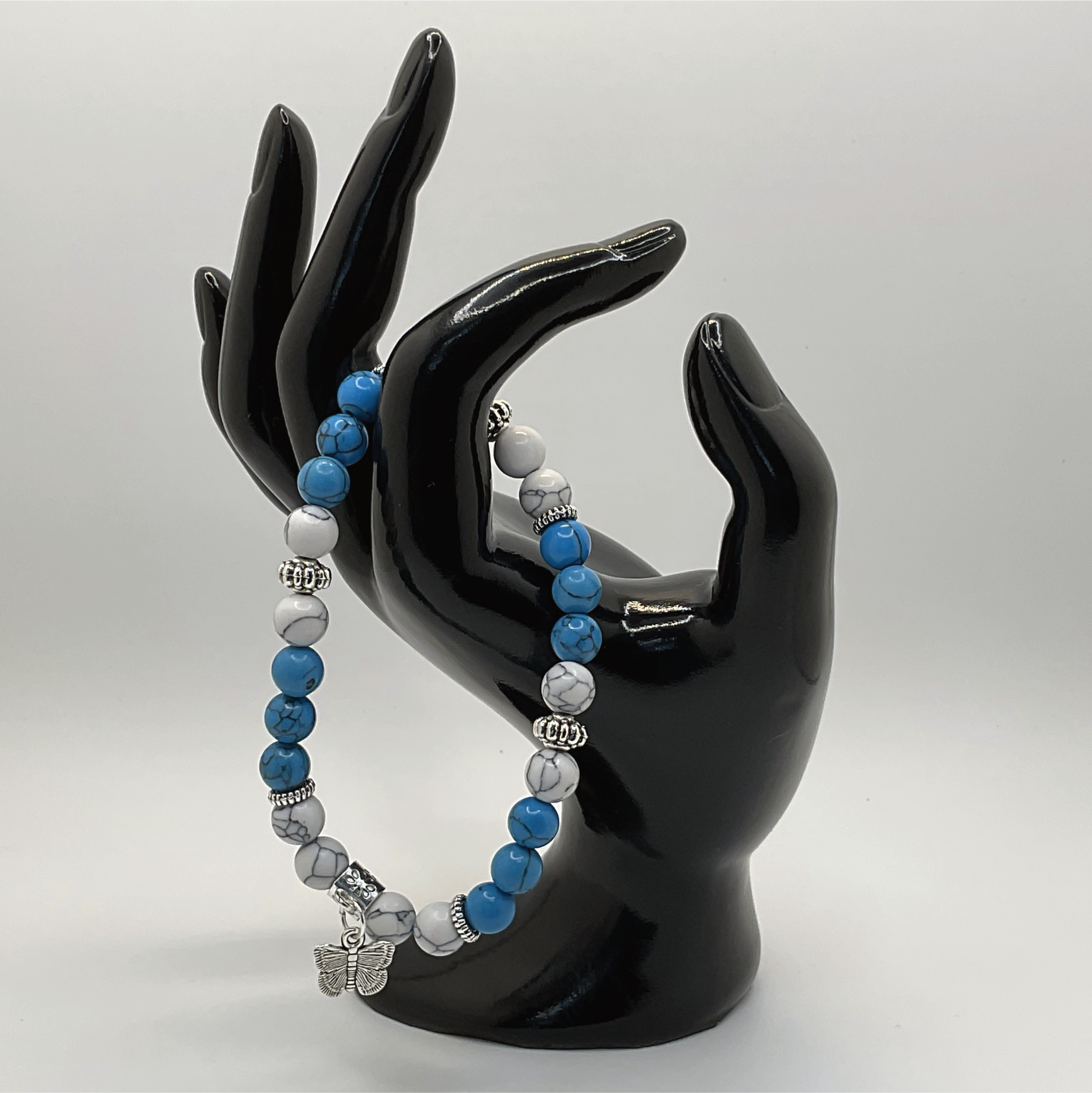 Blue Howlite Magnesite Butterfly Charm Bracelet with Silver Spacers