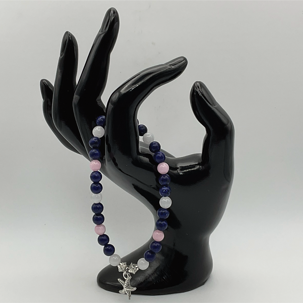 Pulsera de cuarzo rosa sodalita y cuarzo lechoso con dije de estrella de mar