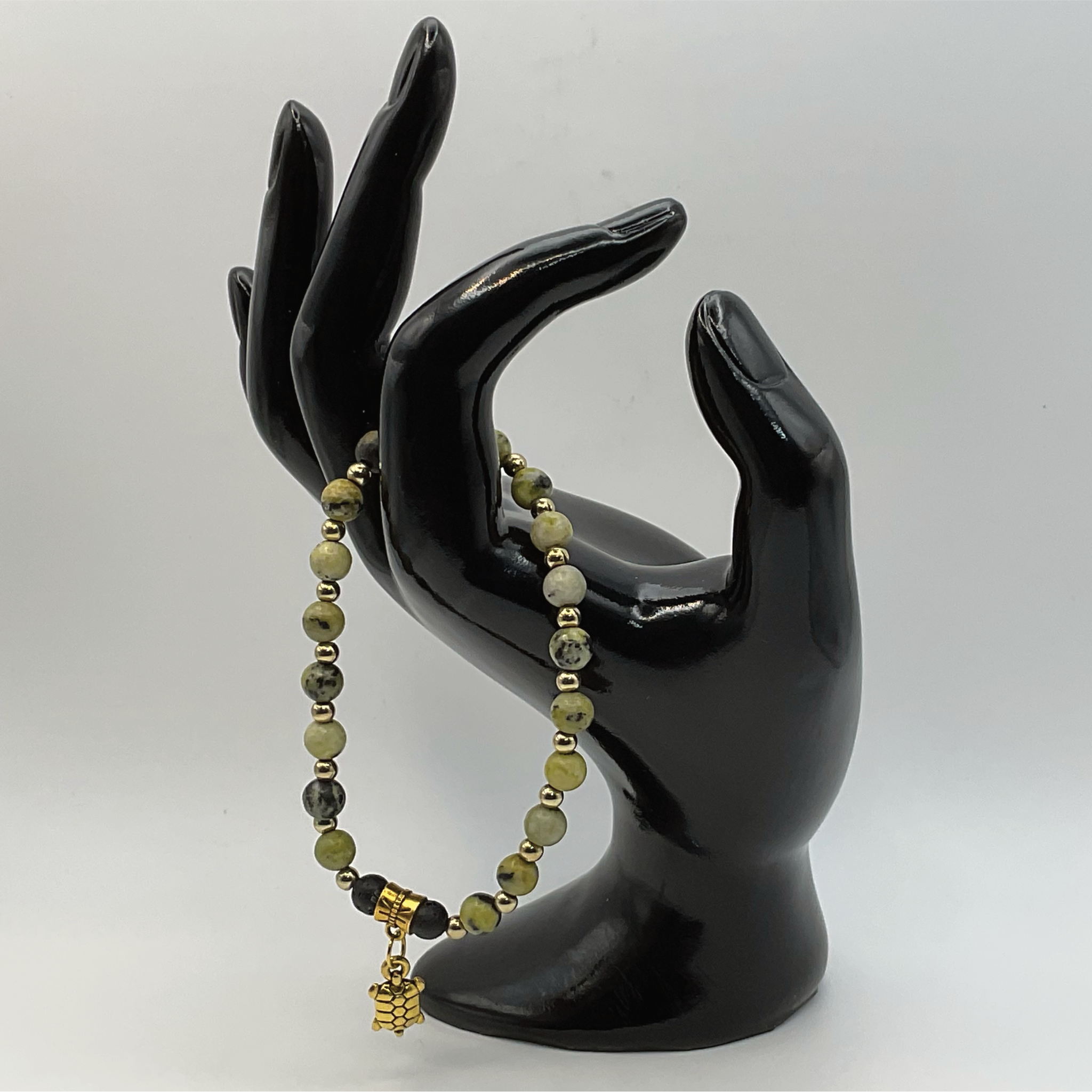 Serpentine Lava Turtle Charm Bracelet with Gold Spacers