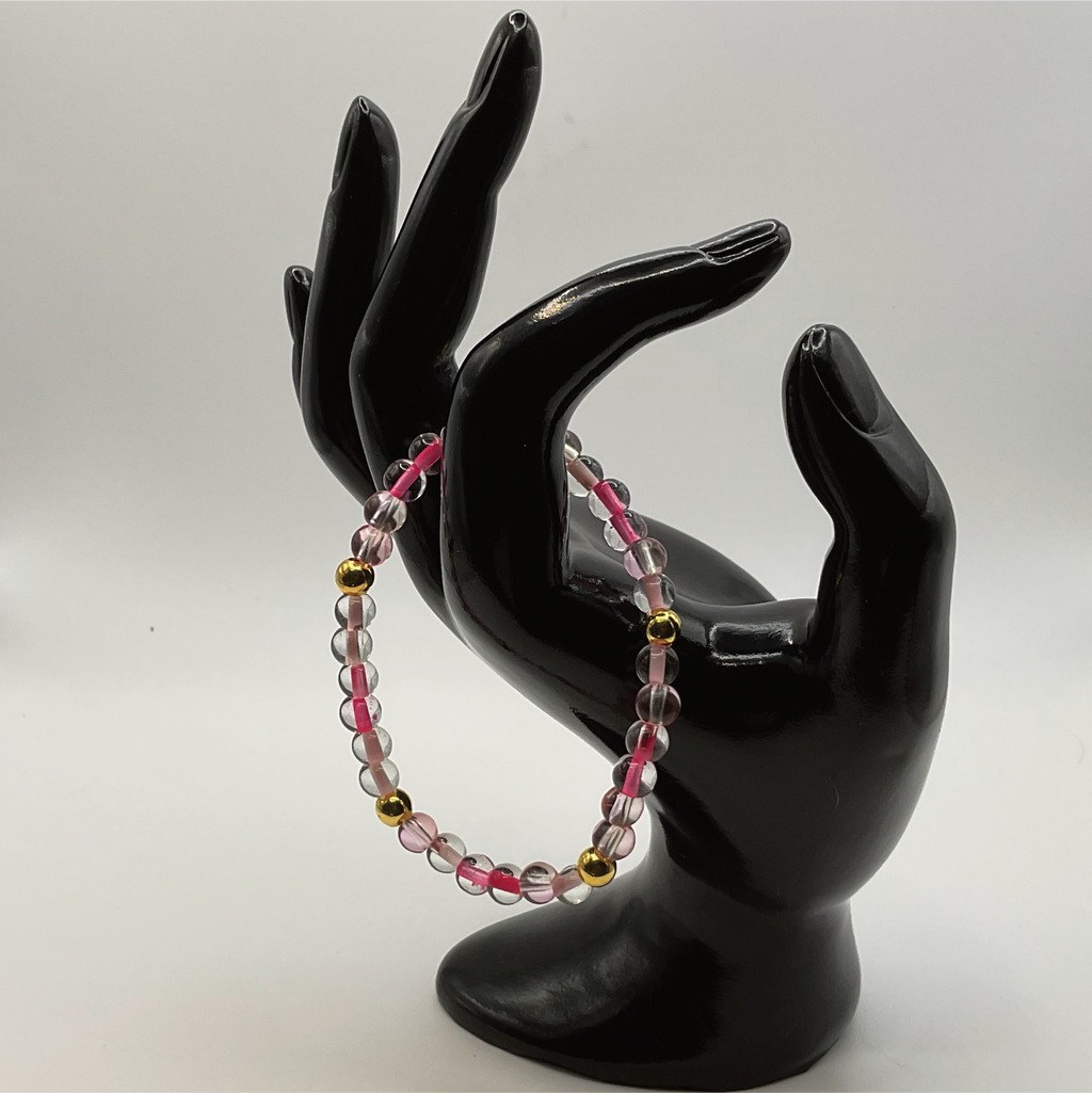 Clear Lined Pink Glass Bracelet with Gold Spacers