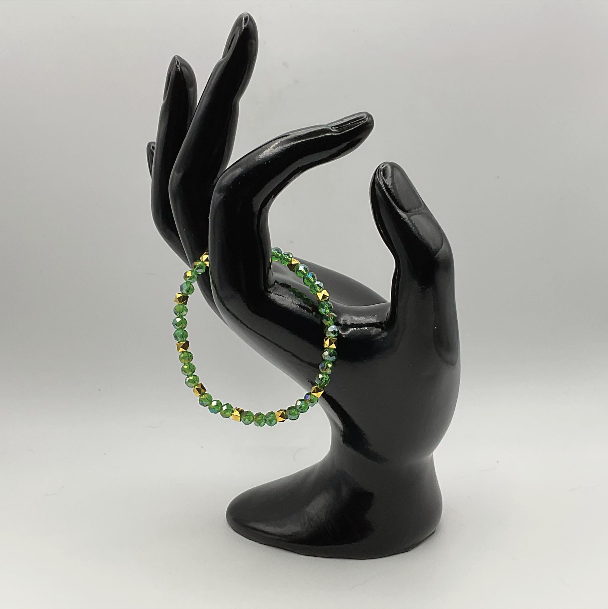 Green Glass Bracelet with Gold Spacers