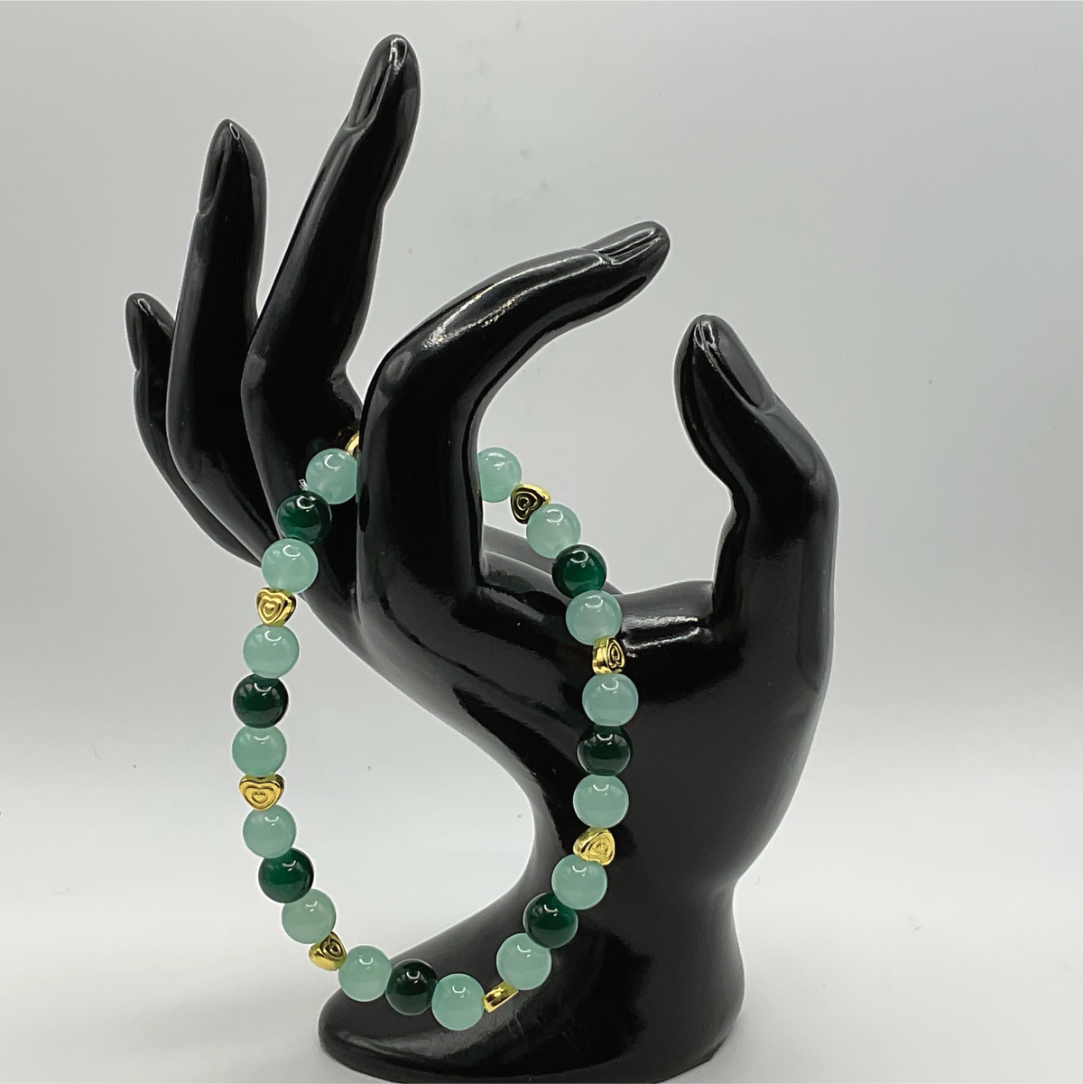 Light and Dark Green Glass Bracelet with Gold Heart Spacers