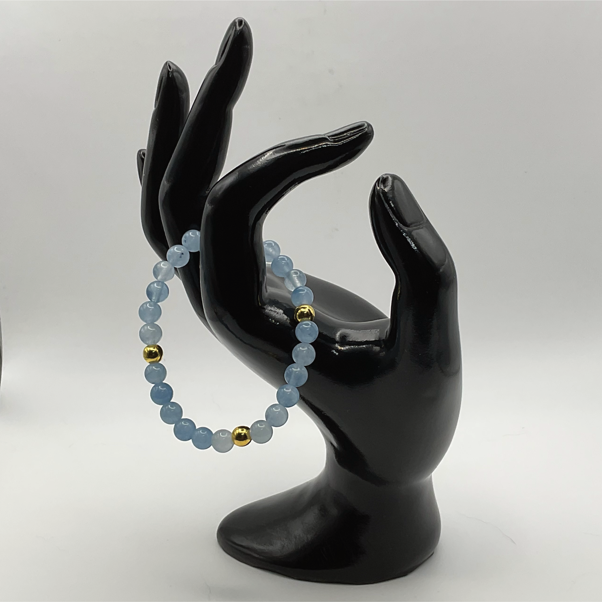 14.5 cm (5.7") Aquamarine Bracelet with Gold Spacers