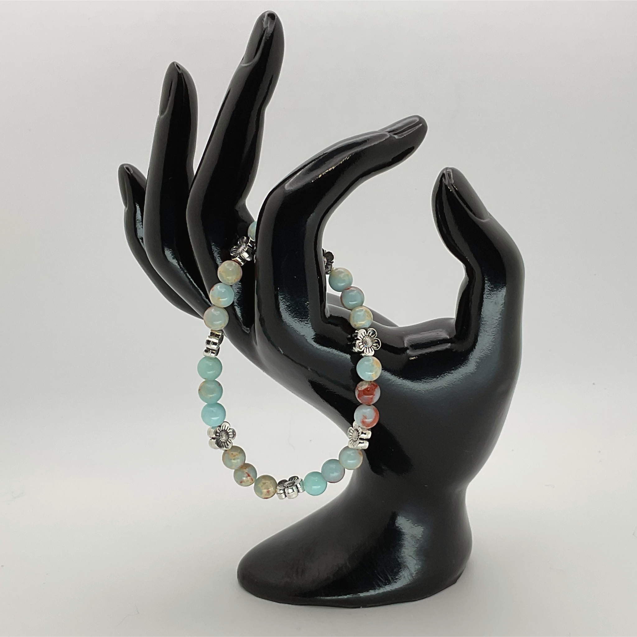 Pulsera de Calcita con Separadores de Flores de Plata