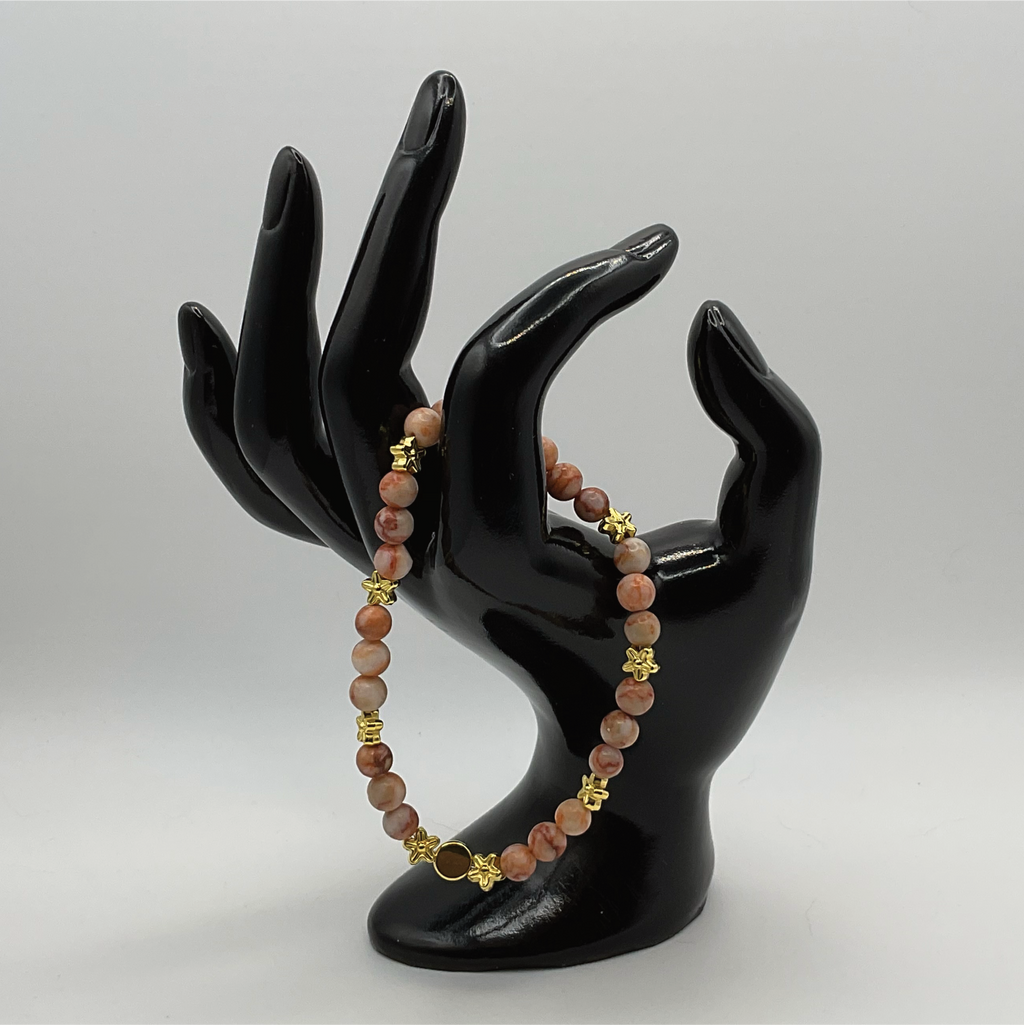 Red Vein Jasper Bracelet with Gold Tone Star and Disc Spacers