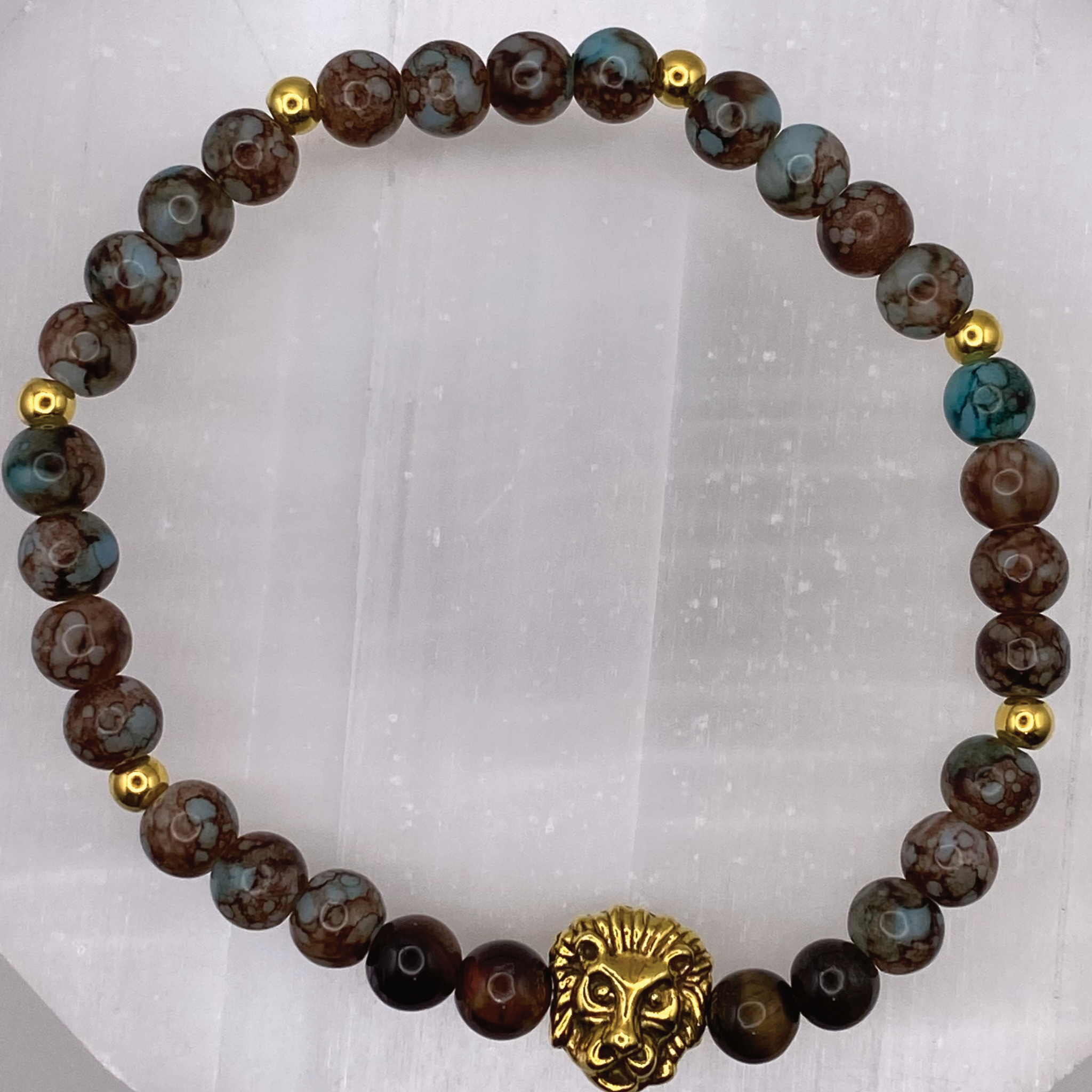 Blue Howlite Lion Charm Bracelet with Gold Tone Spacers