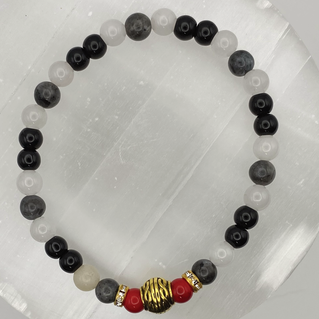 Pulsera de Cuarzo Lechoso y Ágata Negra con Espaciador Tono Oro