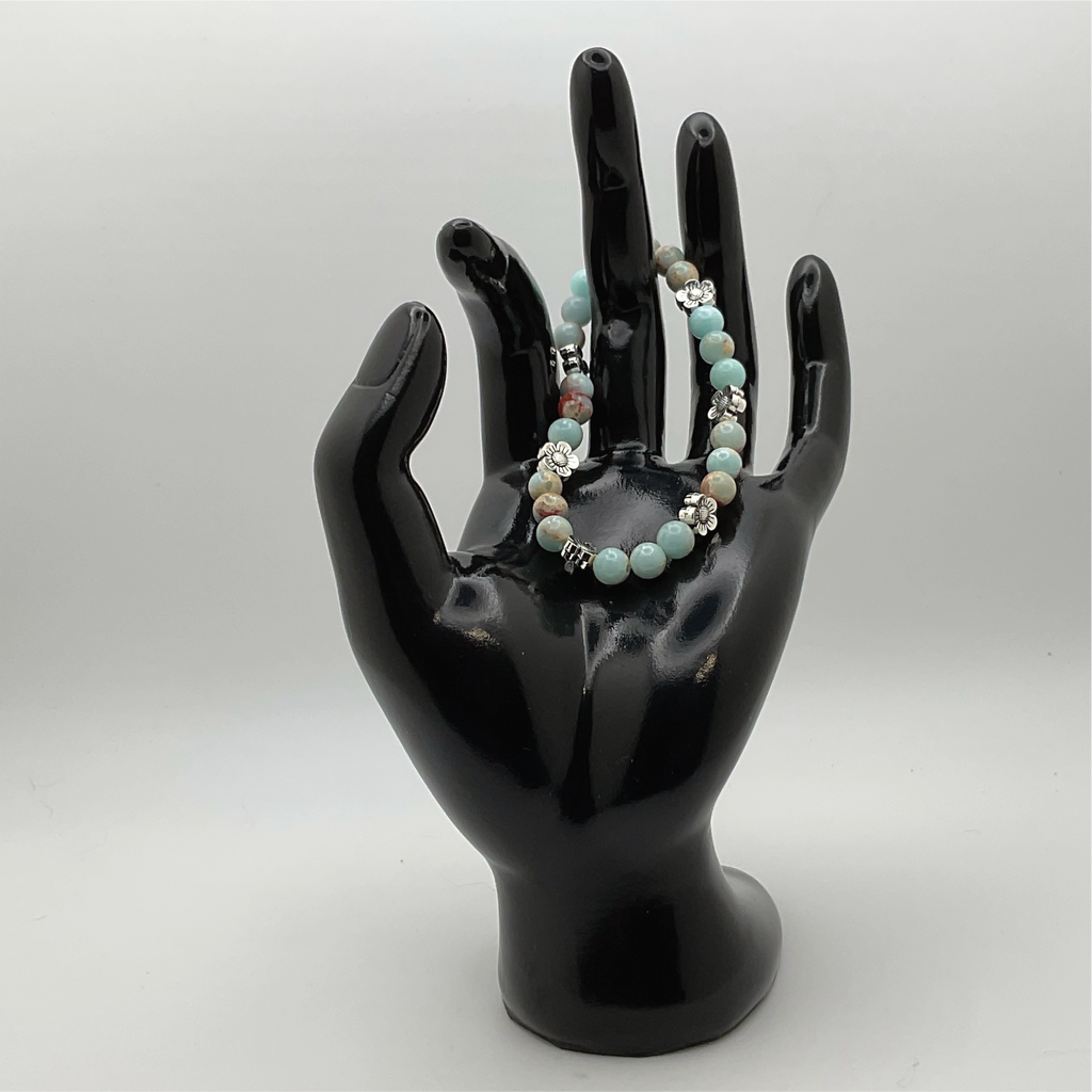 Pulsera de Calcita con Separadores de Flores de Plata