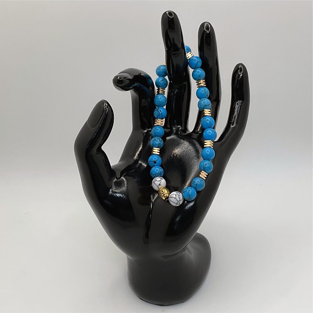 White Blue Howlite Bracelet with Gold Spacers