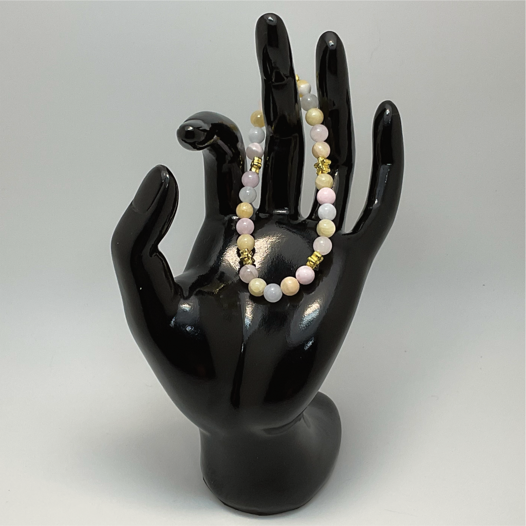 Pulsera de ópalo rosa, cuarzo lechoso y citrino con espaciadores de estrella dorados