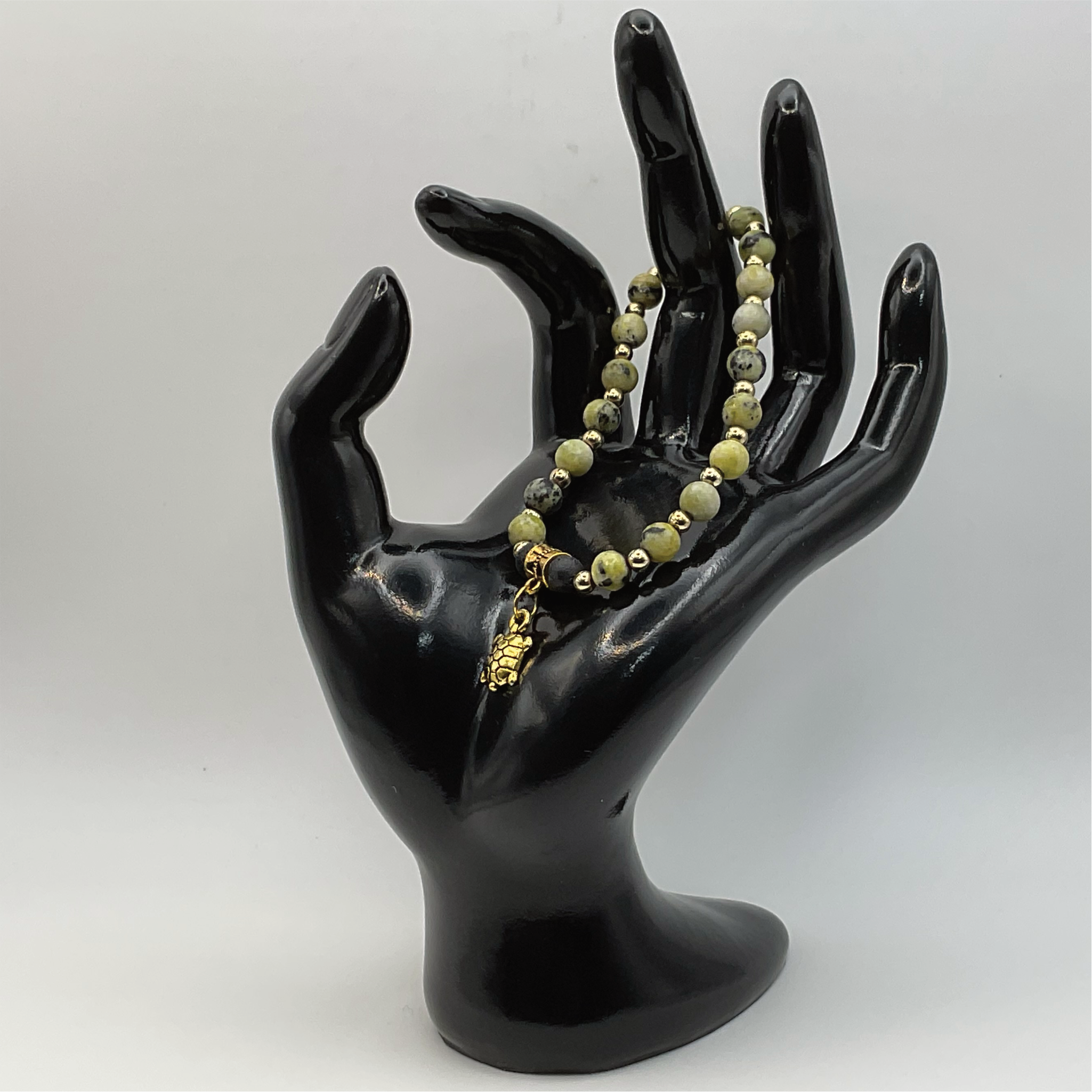 Serpentine Lava Turtle Charm Bracelet with Gold Spacers