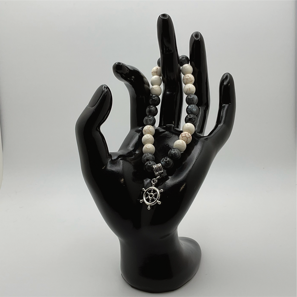 Pulsera con dije de timón de piedra Picasso de magnesita