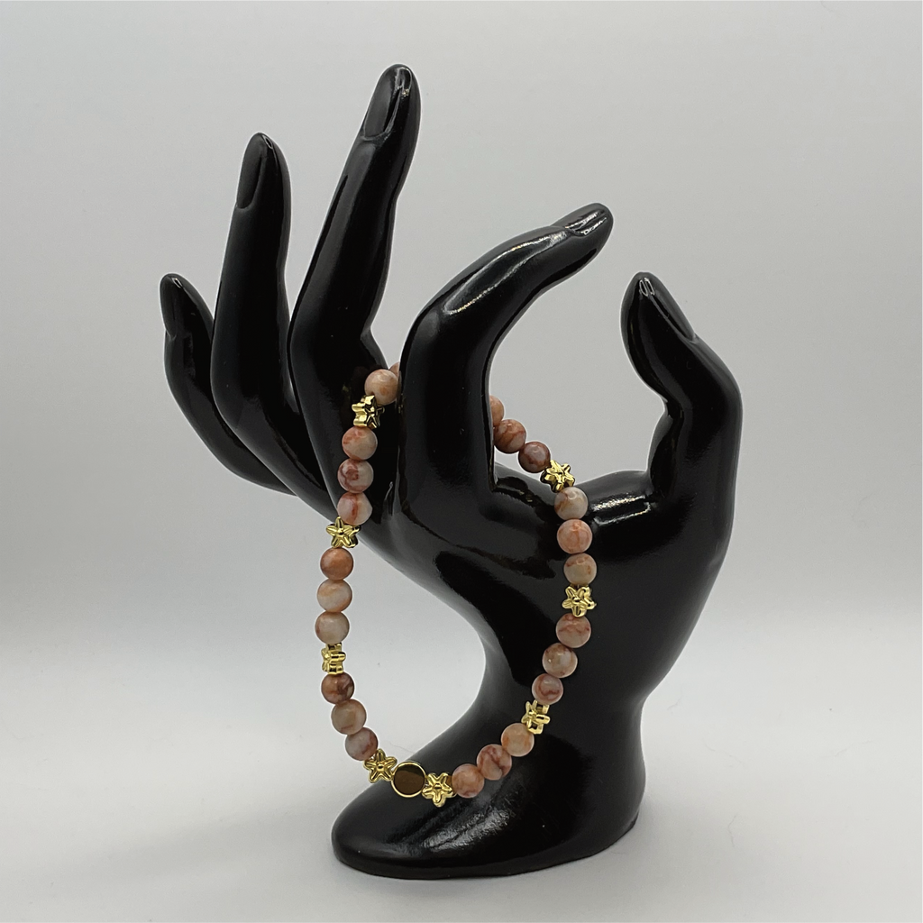Red Vein Jasper Bracelet with Gold Tone Star and Disc Spacers