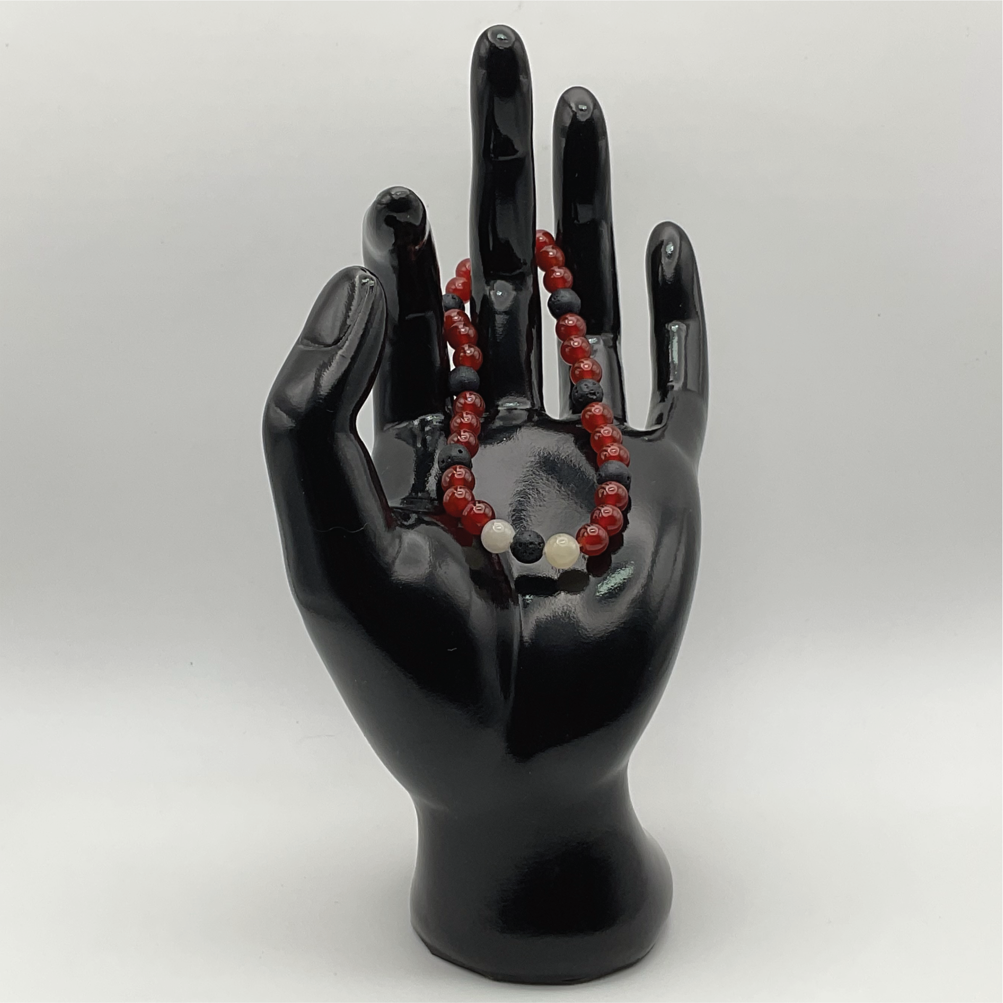 Pulsera de ágata cornalina, lava y cuarzo lechoso