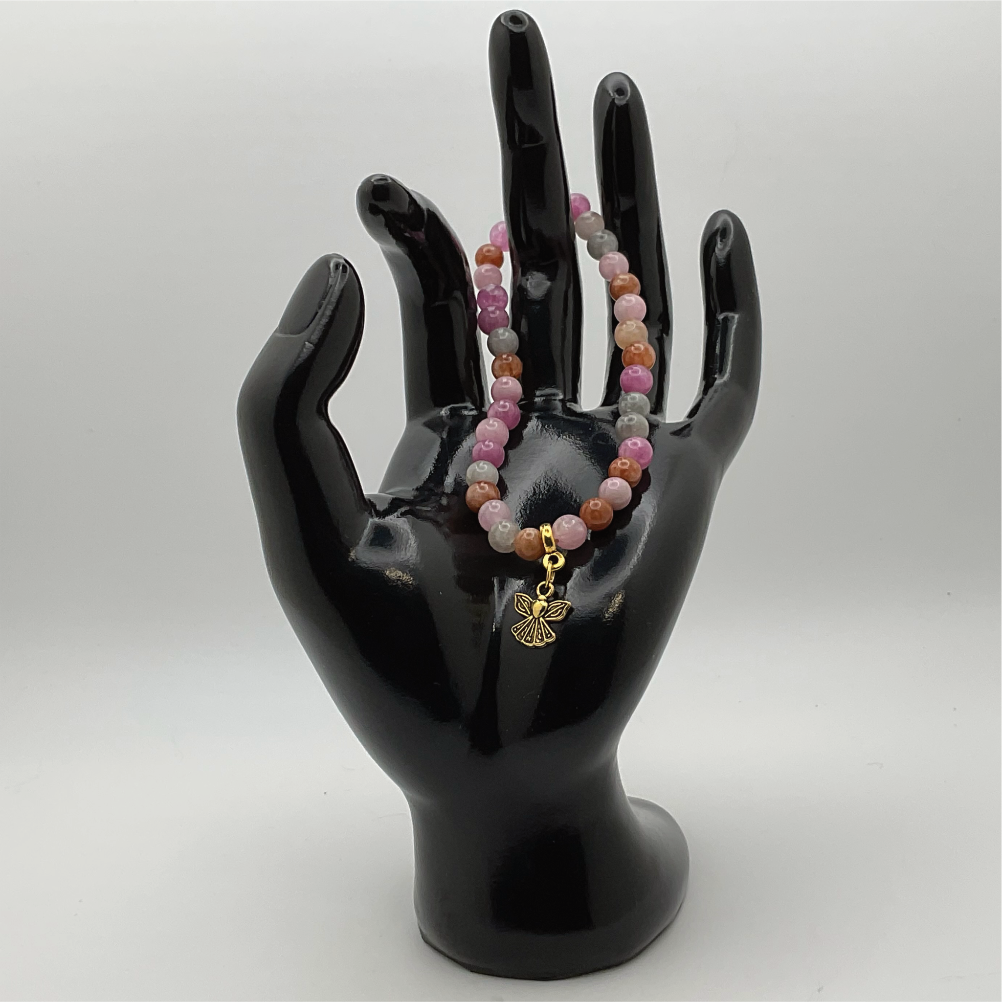 Pulsera de turmalina rubelita con dije de ángel